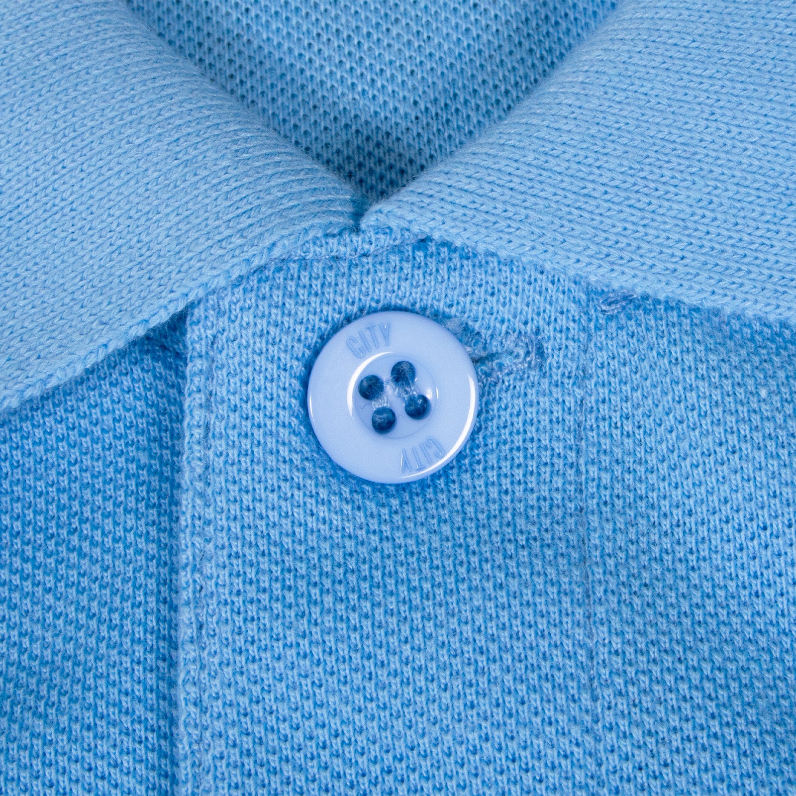 Man City adults polo shirt in sky blue with club crest to the chest.