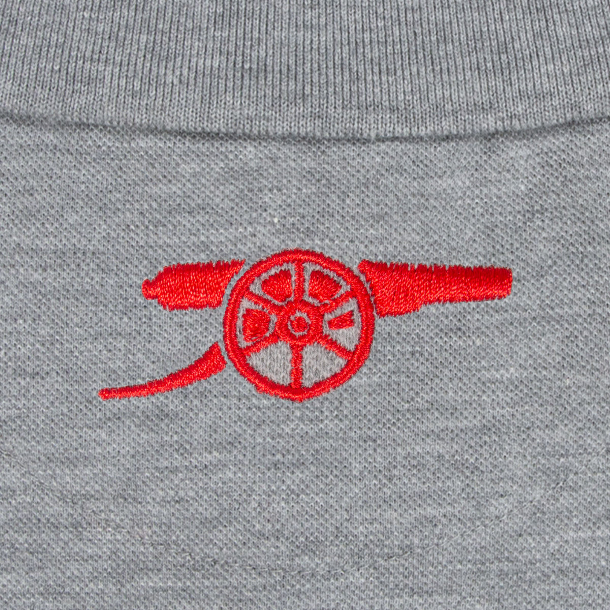 Arsenal polo shirt for adults in grey featuring the club crest and Champions 2026 graphic to the chest