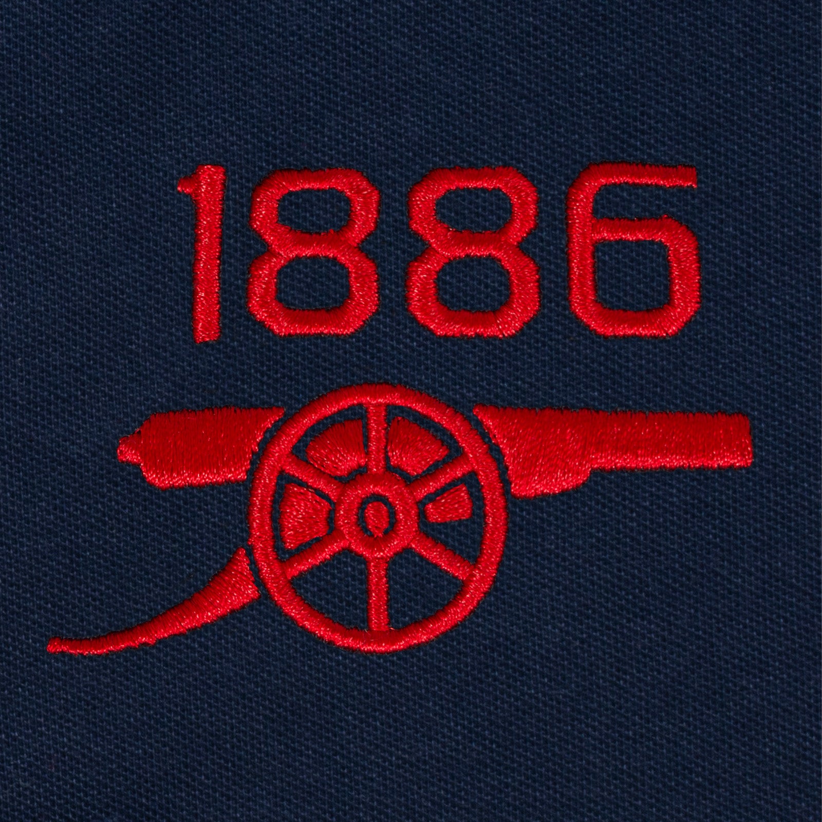 Arsenal polo shirt for adults in navy blue with club crest and canon to chest.