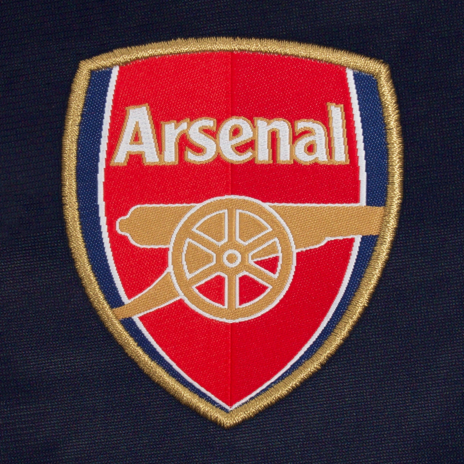 Arsenal kids retro track jacket in navy blue with club crest to chest.