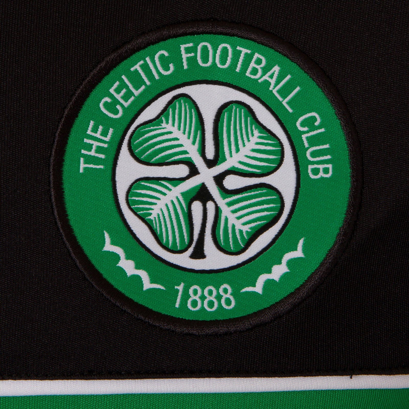 Celtic adults T-shirt in black & green stripe with club crest to chest