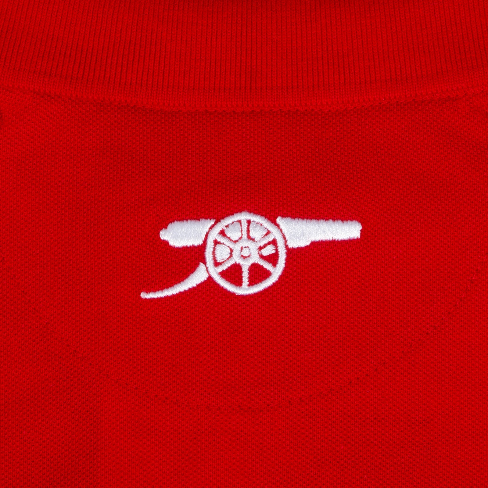 Arsenal polo shirt for kids in red with club crest and canon to chest.