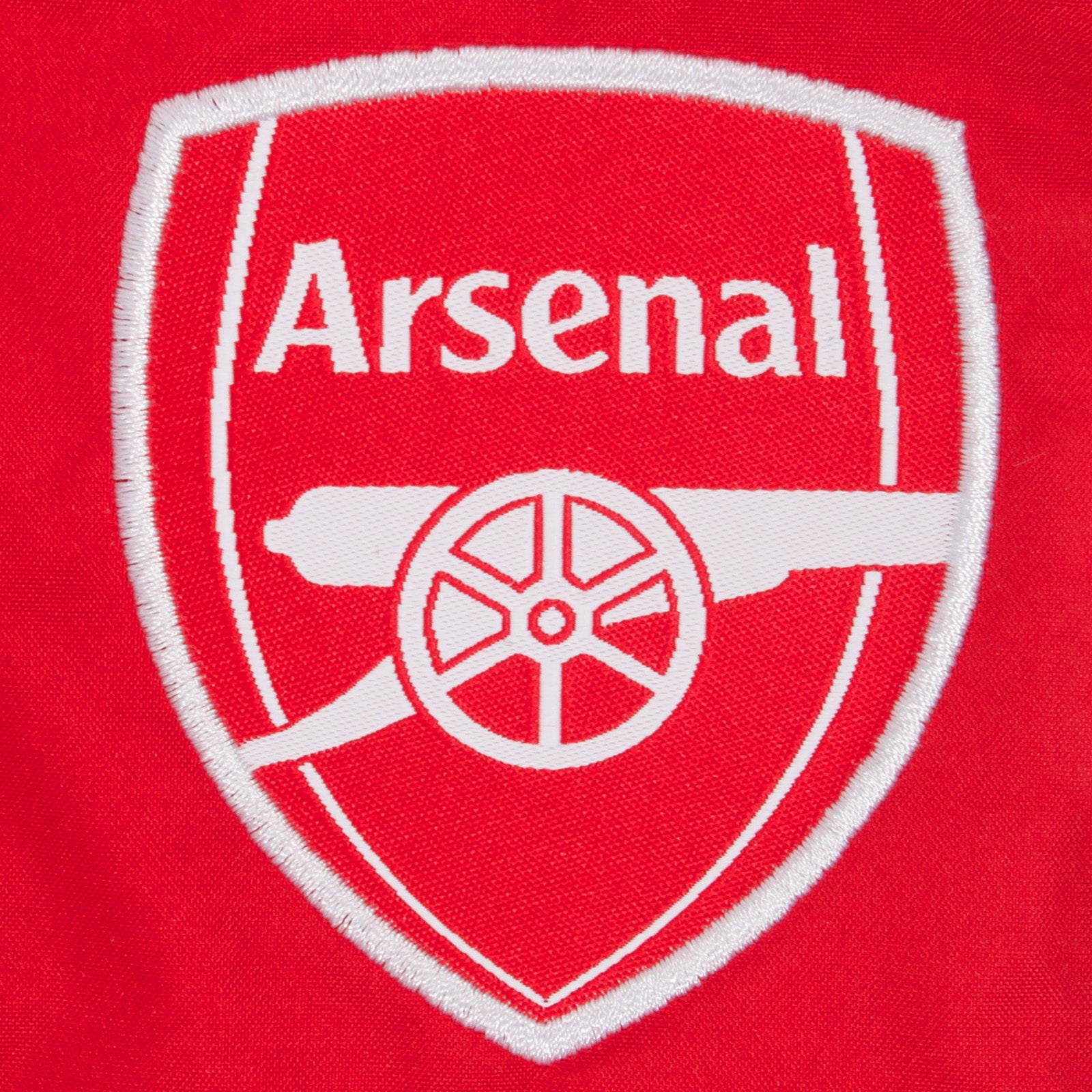 Arsenal kids shower jacket in navy blue with club crest to front.