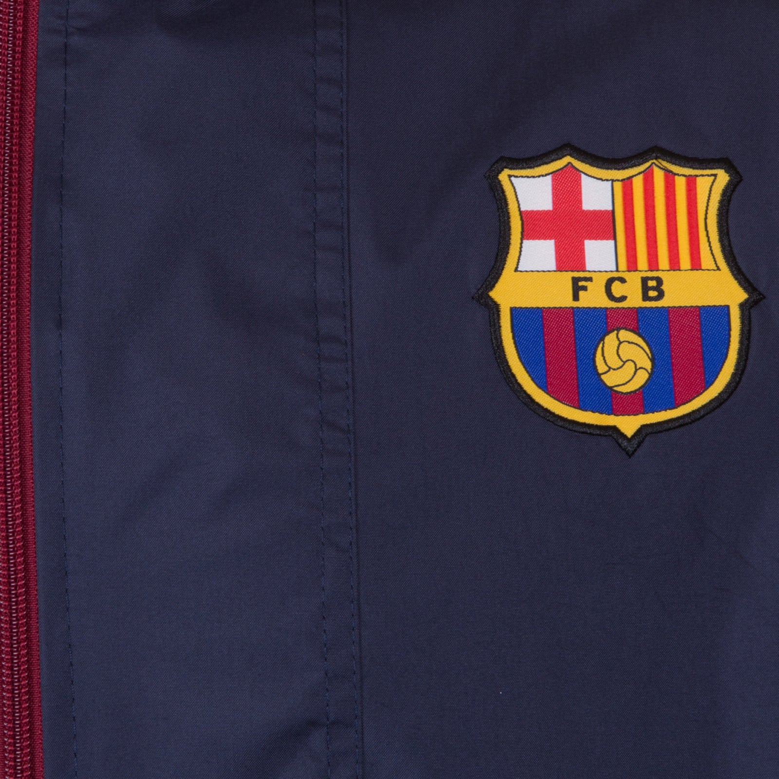 FC Barcelona adults half zip shower jacket in navy blue with a FCB club crest to chest.