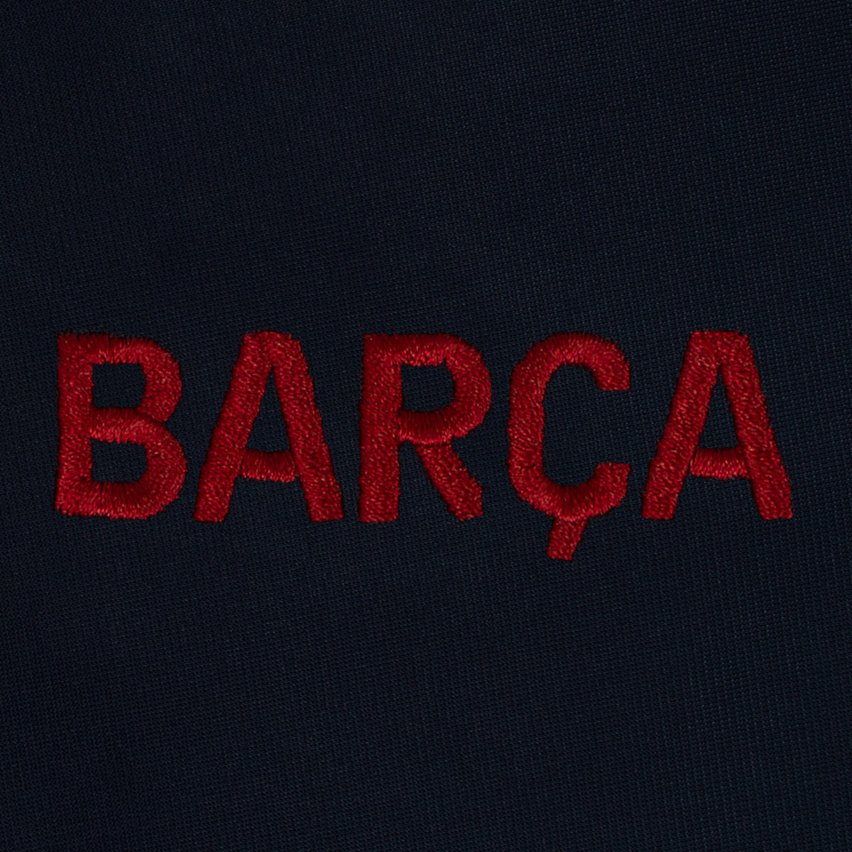 FC Barcelona kids retro track jacket in navy blue with FCB badge to chest.