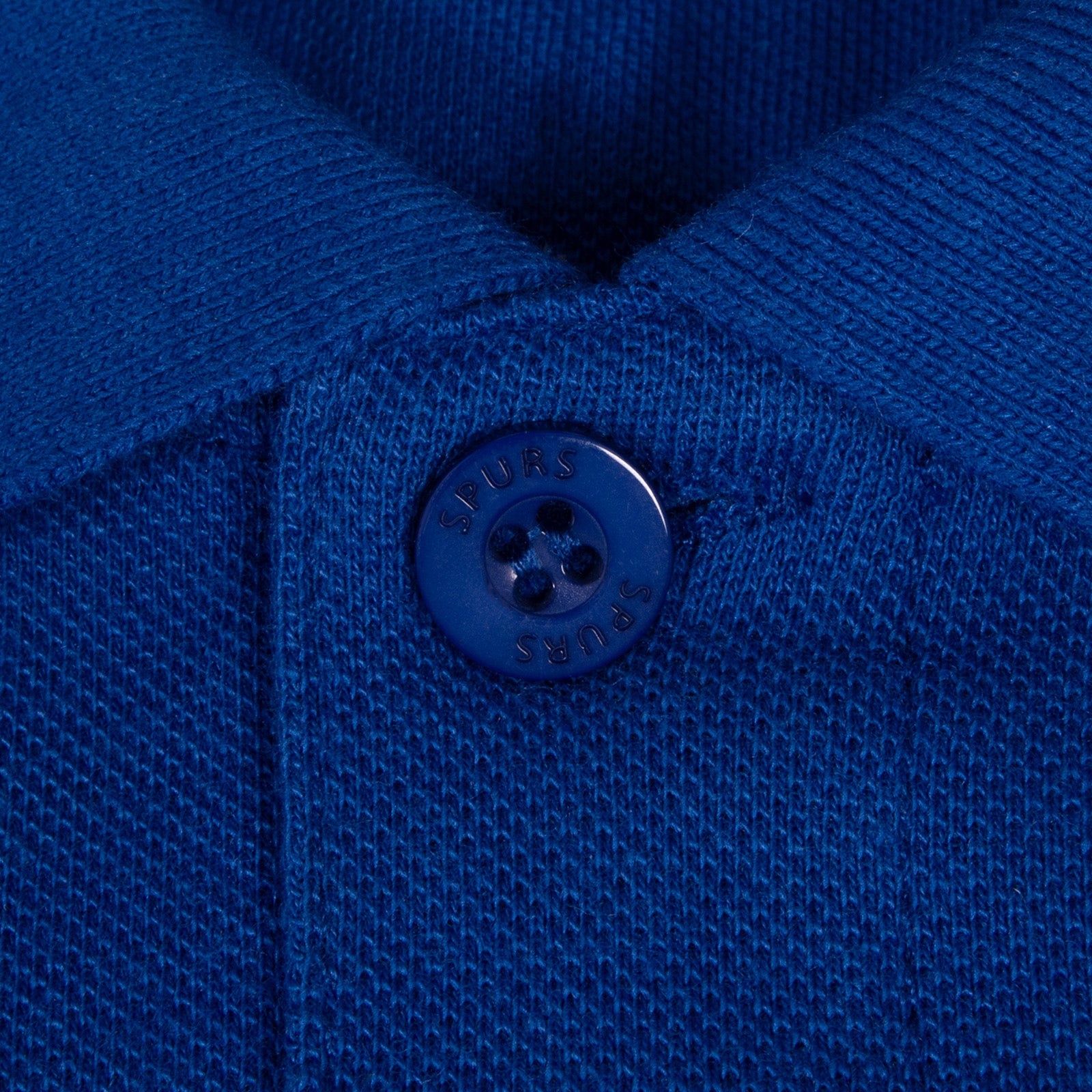 Spurs adults polo shirt in marine with Spurs badge and text to chest.