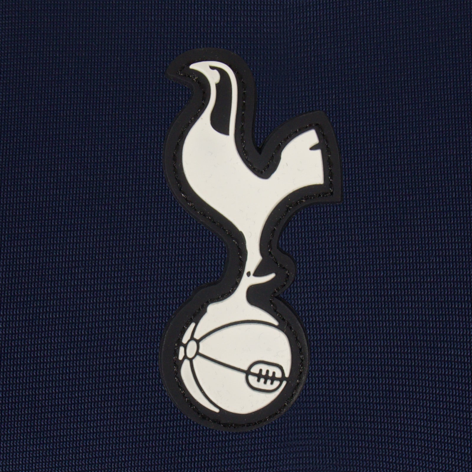 Spurs adults retro track jacket in navy blue with club crest to chest.
