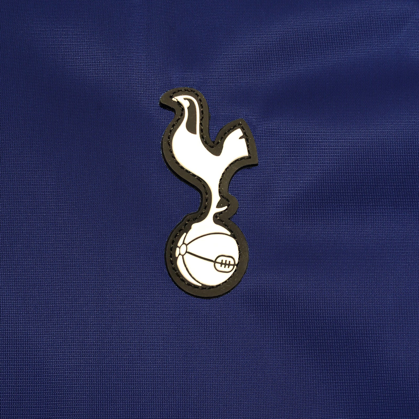 Spurs adults retro track jacket in navy blue with club crest to chest.