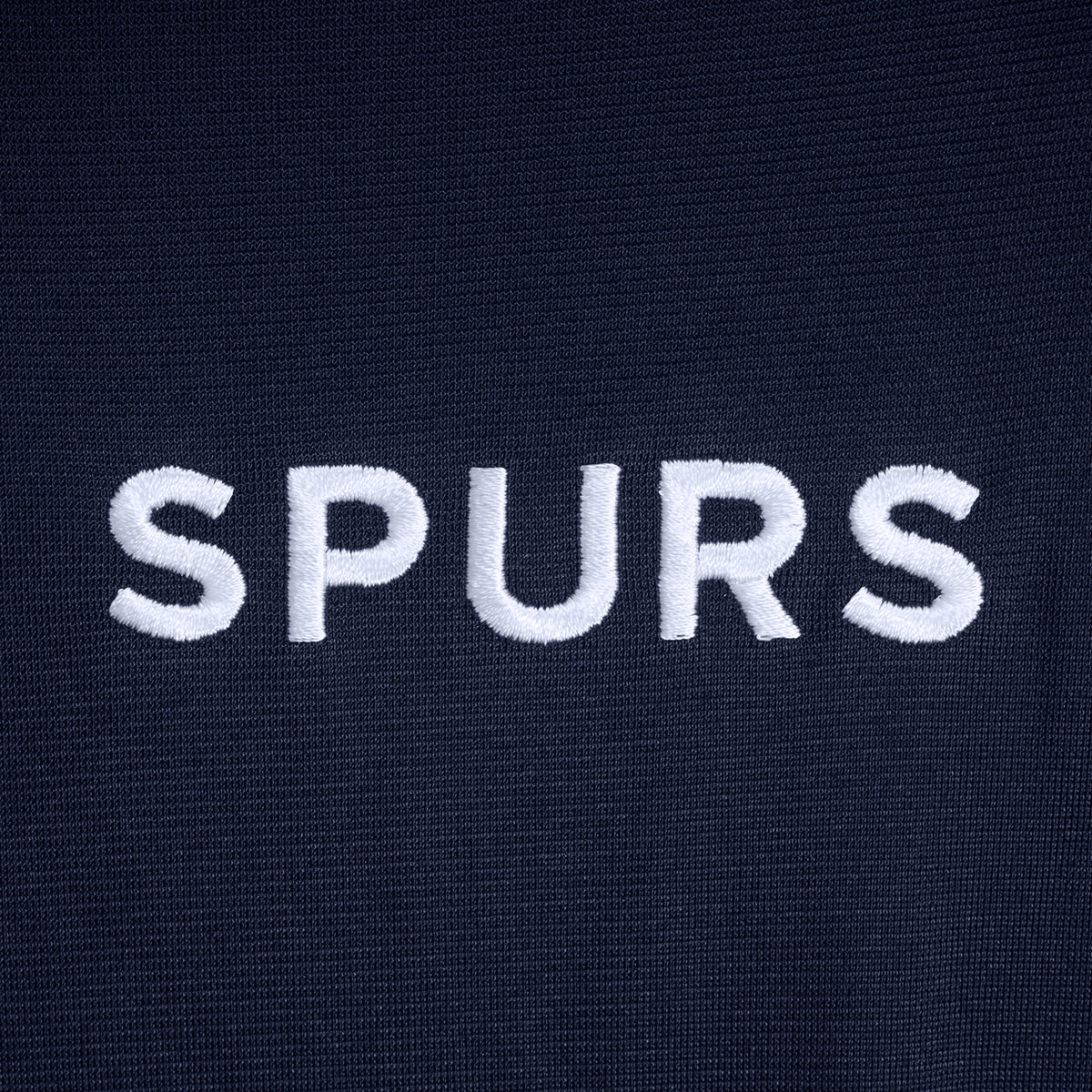 Spurs adults retro track jacket in navy blue with club crest to chest.