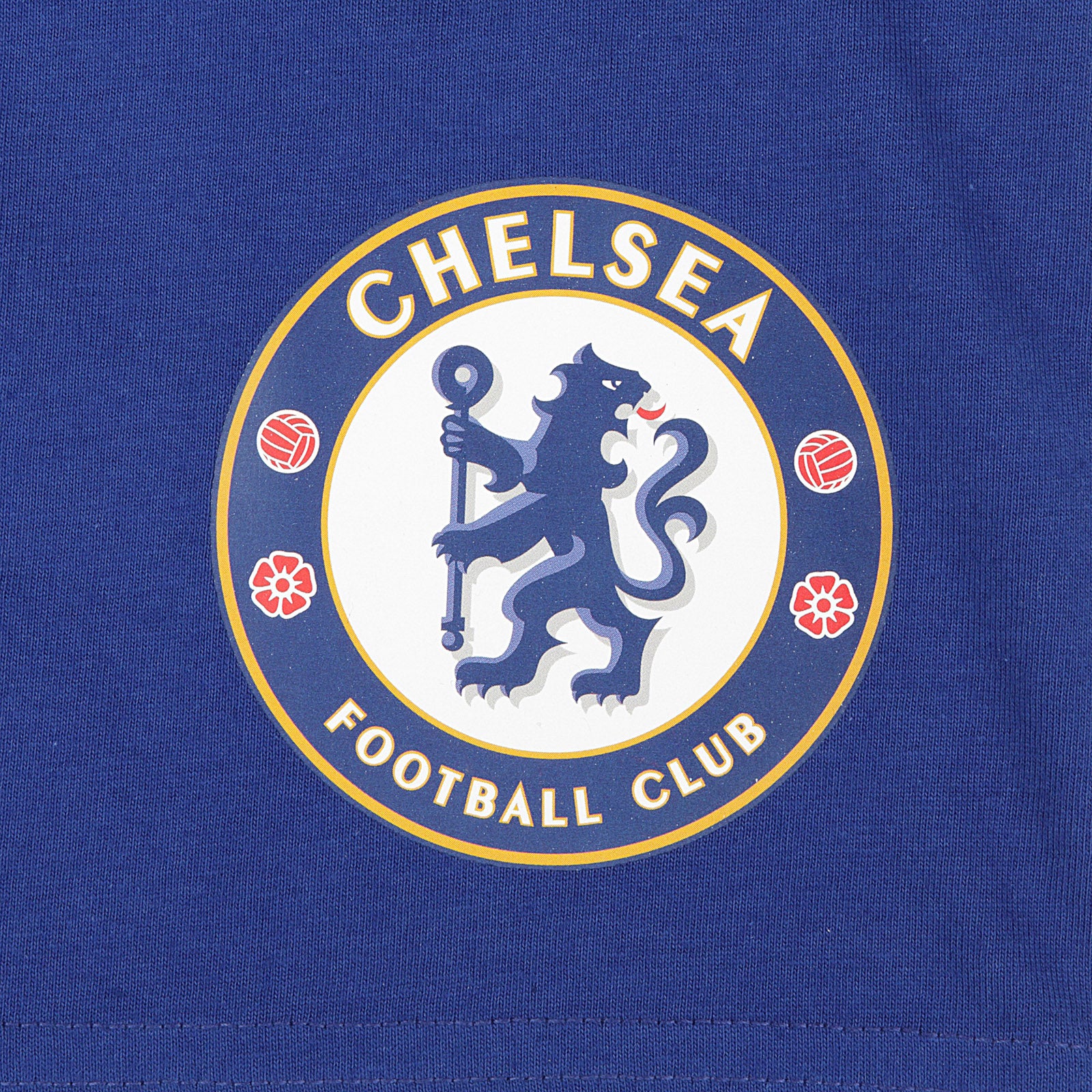 Chelsea kids pyjamas in blue. Short sleeve top with Chelsea branded graphic and shorts with CFC logo to the left leg