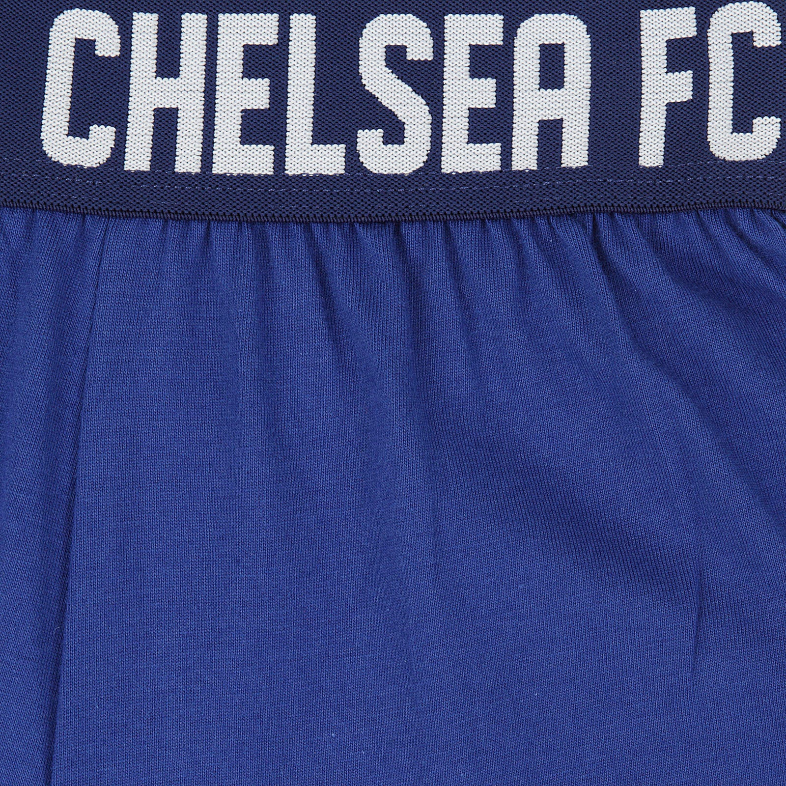 Chelsea kids pyjamas in blue. Short sleeve top with Chelsea branded graphic and shorts with CFC logo to the left leg