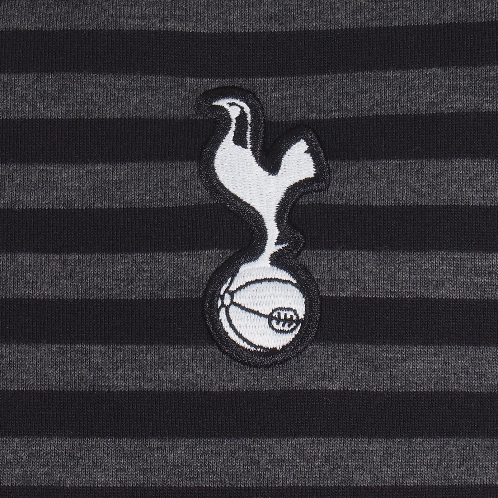 Spurs adults striped polo shirt in black & grey with club crest to chest.