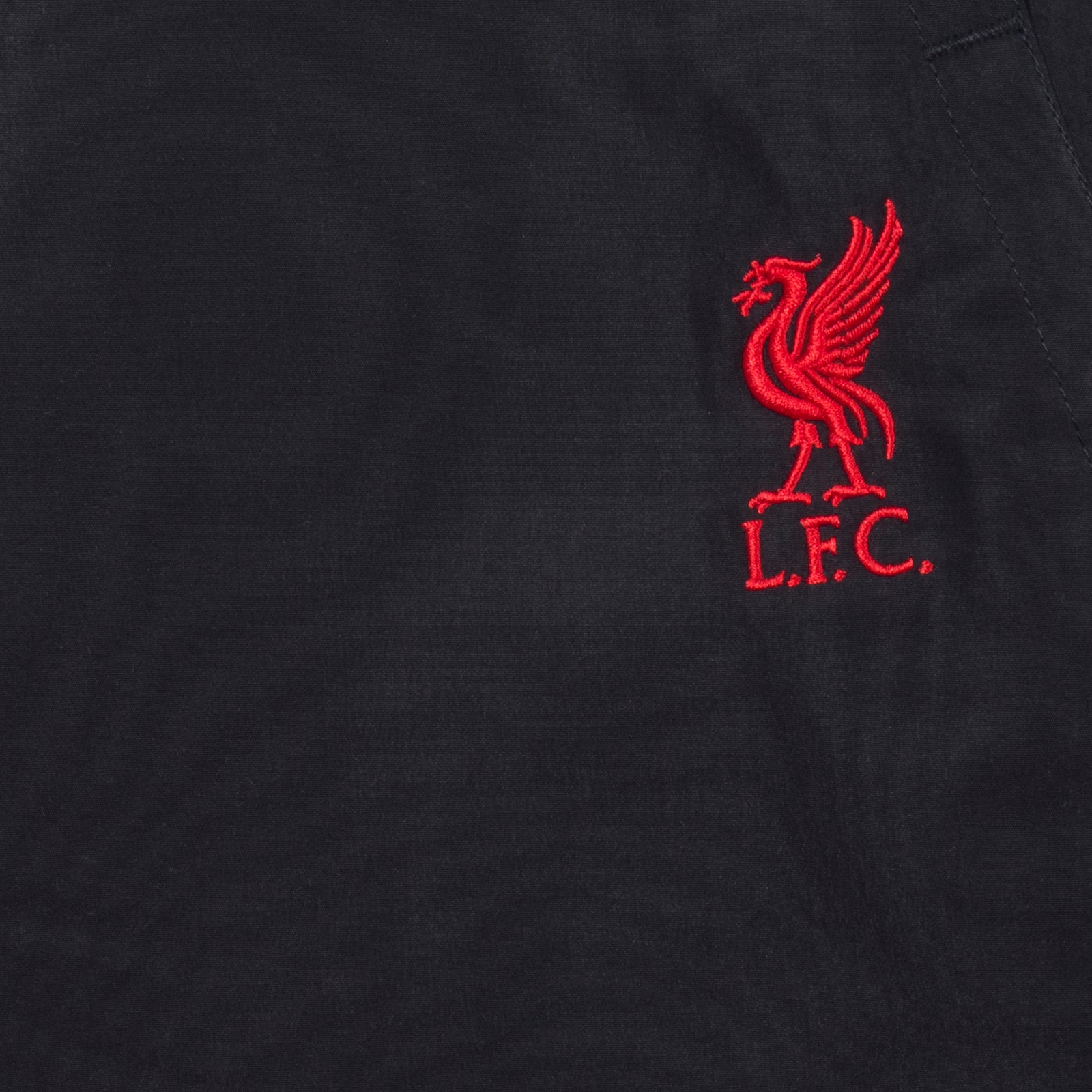 Liverpool kids tracksuit in red with liverbird badge to chest and left thigh