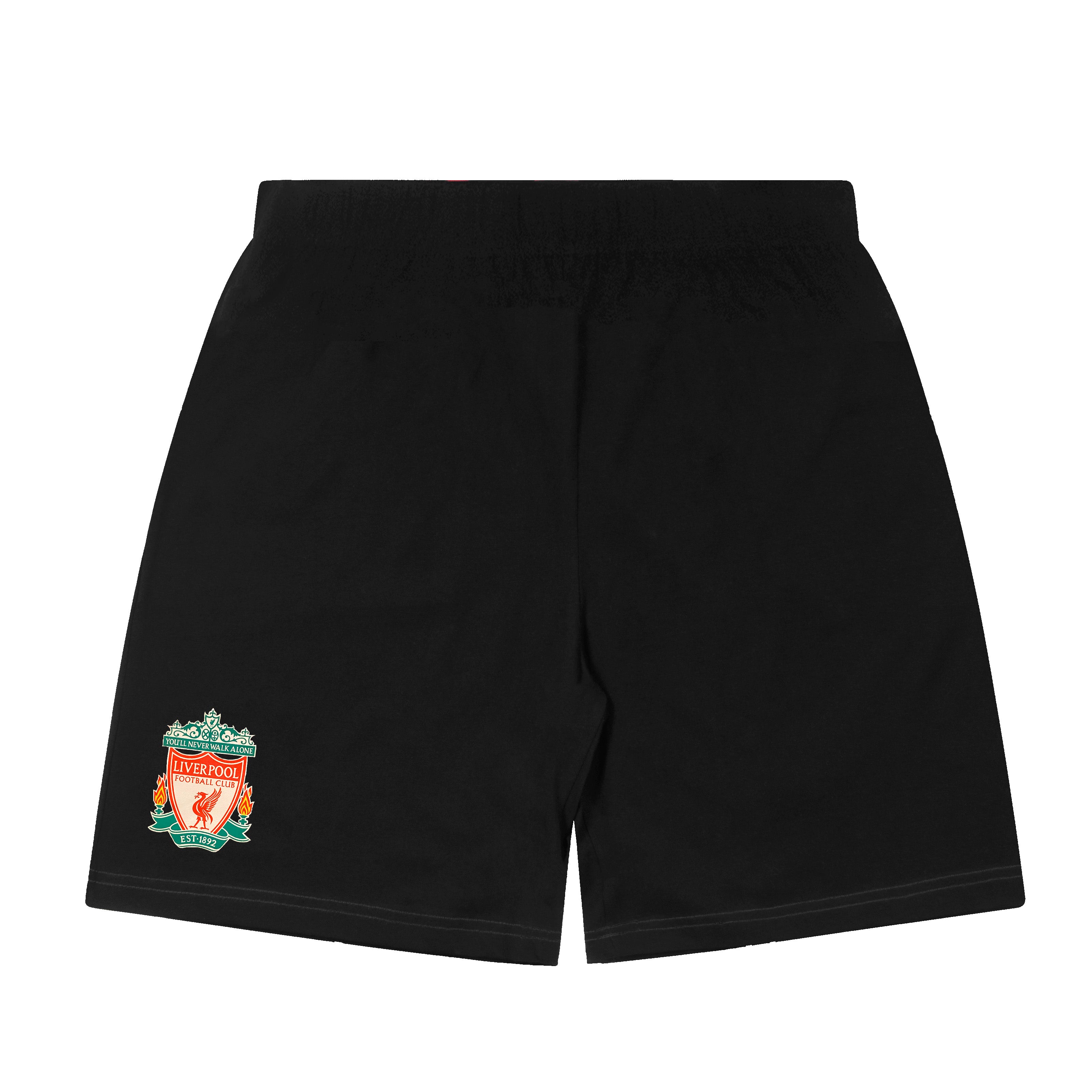 Liverpool kids pyjamas in black. Short sleeve top with graphic and shorts with logo to the left leg