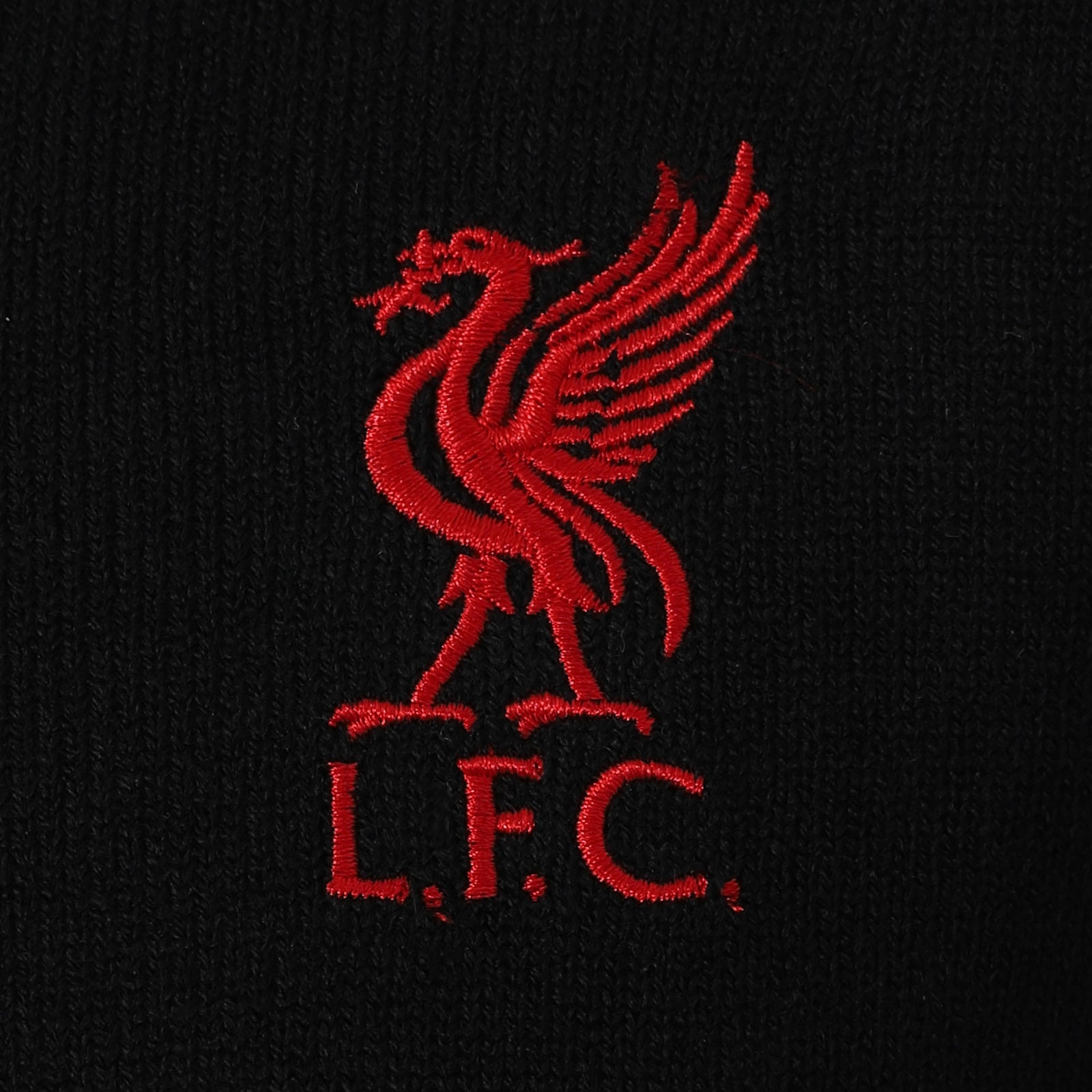 Liverpool adults knitted jumper in black with LFC club crest to chest