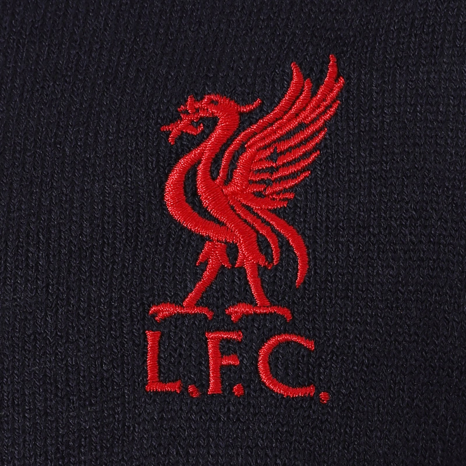 Liverpool adults knitted jumper in navy blue with LFC club crest to chest