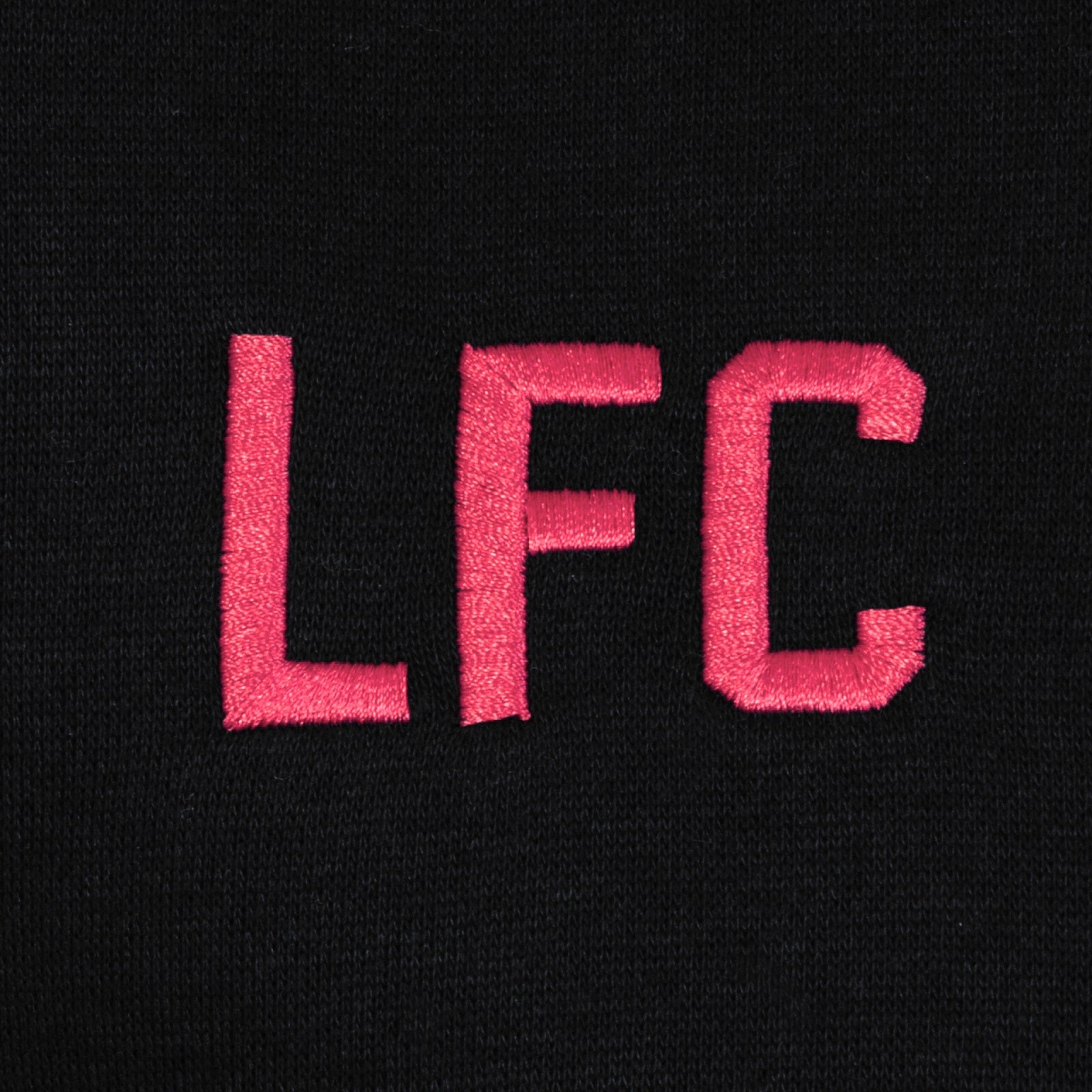 Liverpool kids zip hoodie in black with club crest on the left chest.