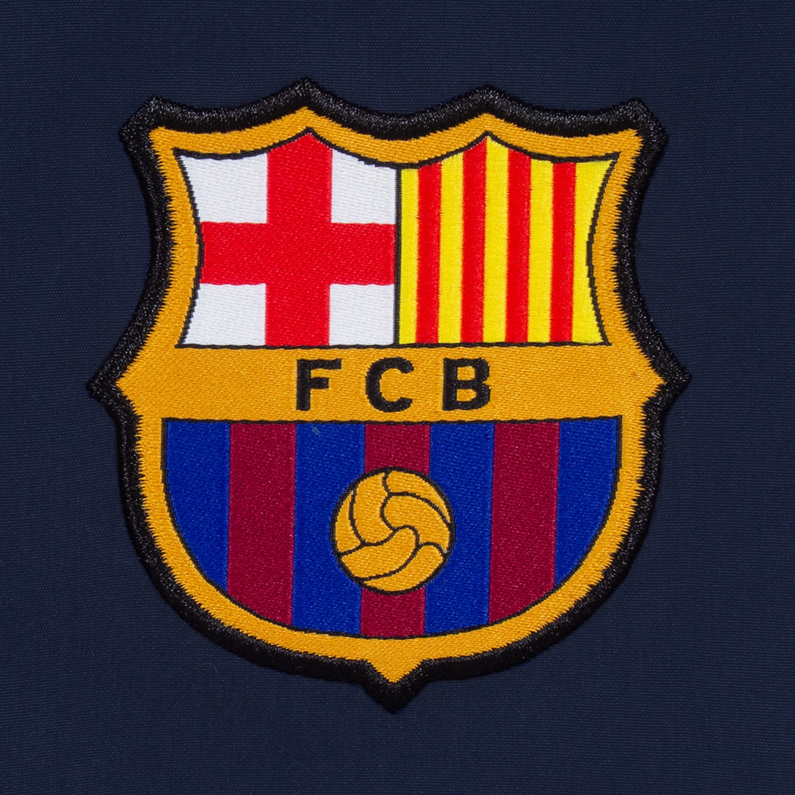 FC Barcelona adults tracksuit in navy blue with club crest to chest and left thigh