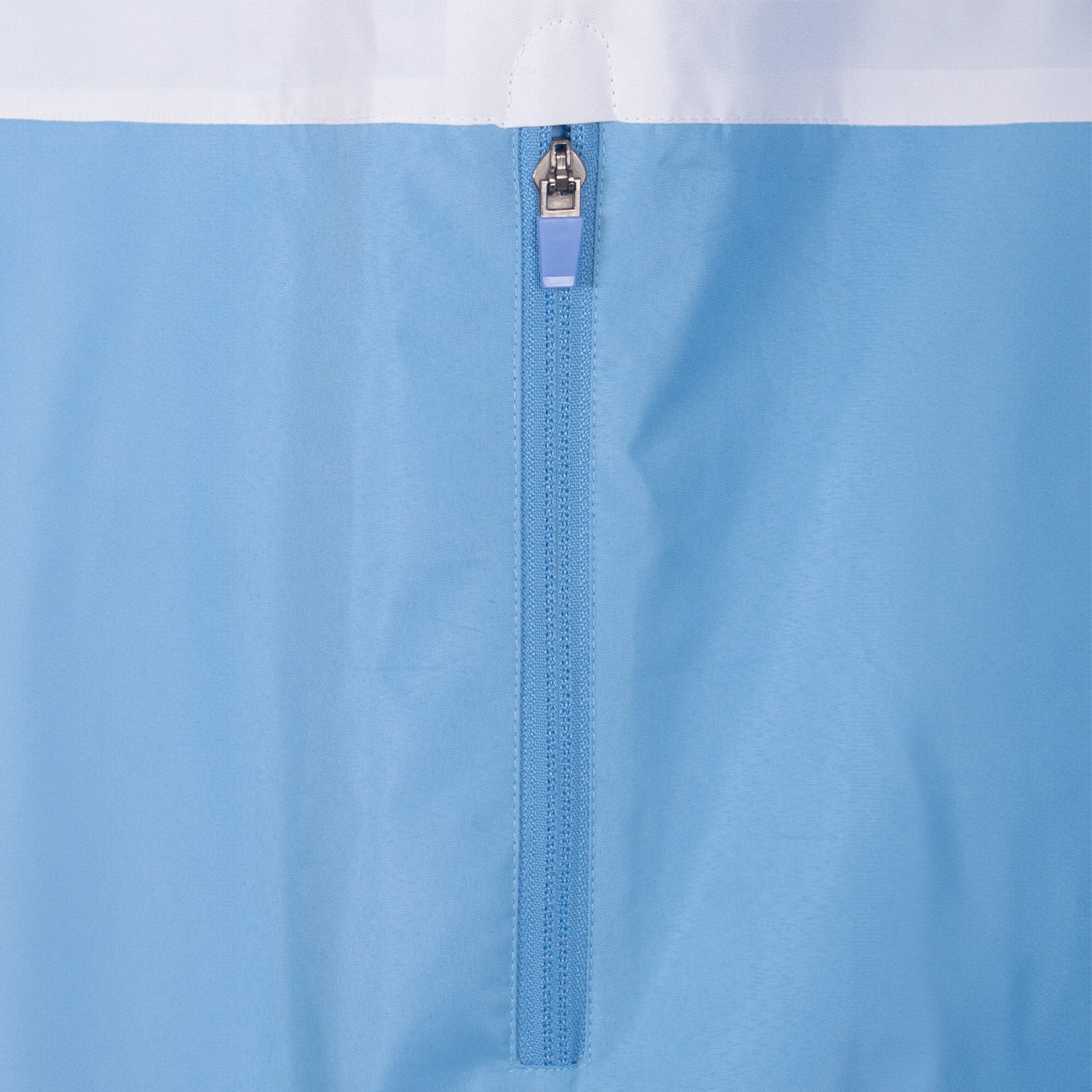 Man City adults shower jacket in sky blue & white with club crest to chest.