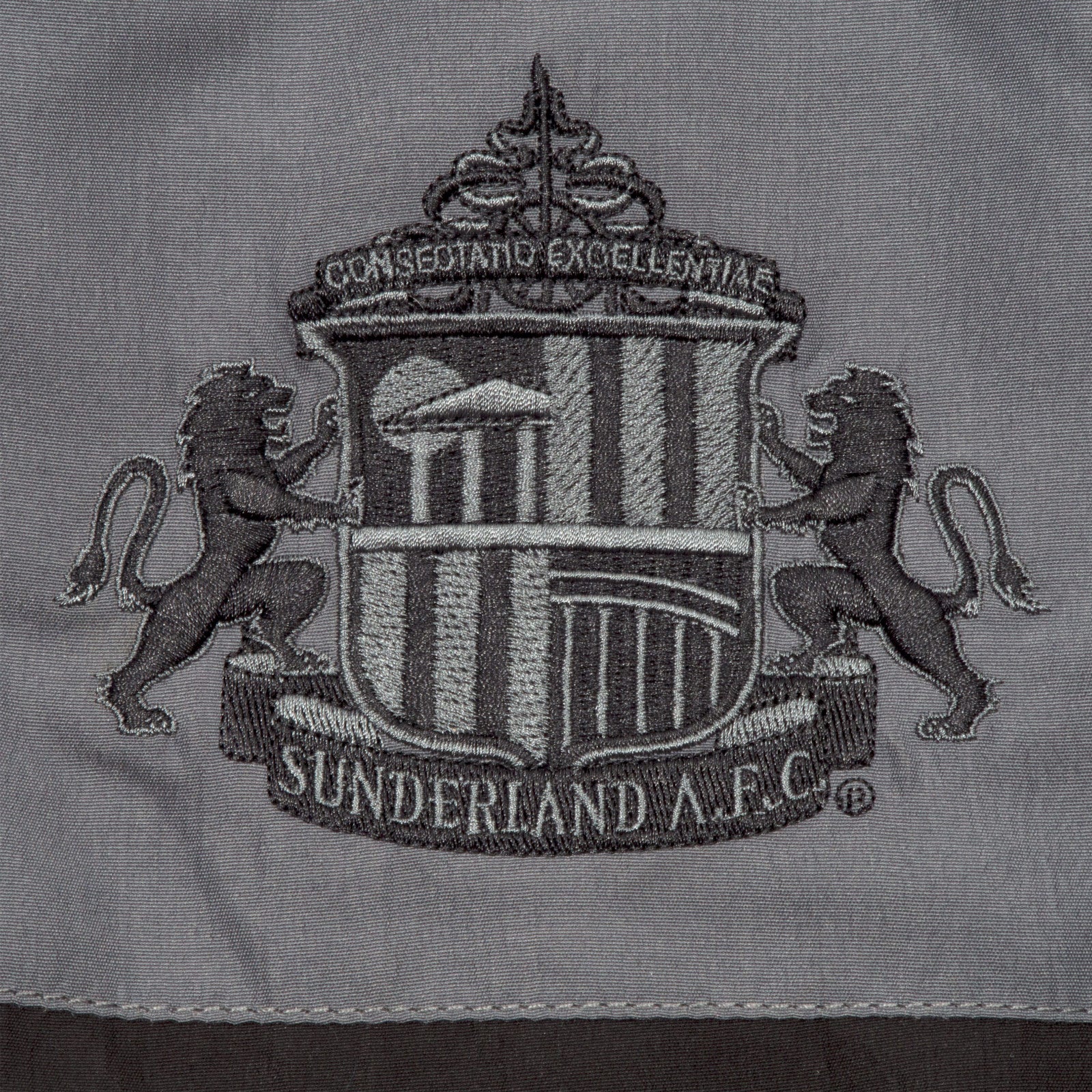 Sunderland kids tracksuit in grey with club crest to chest and left thigh