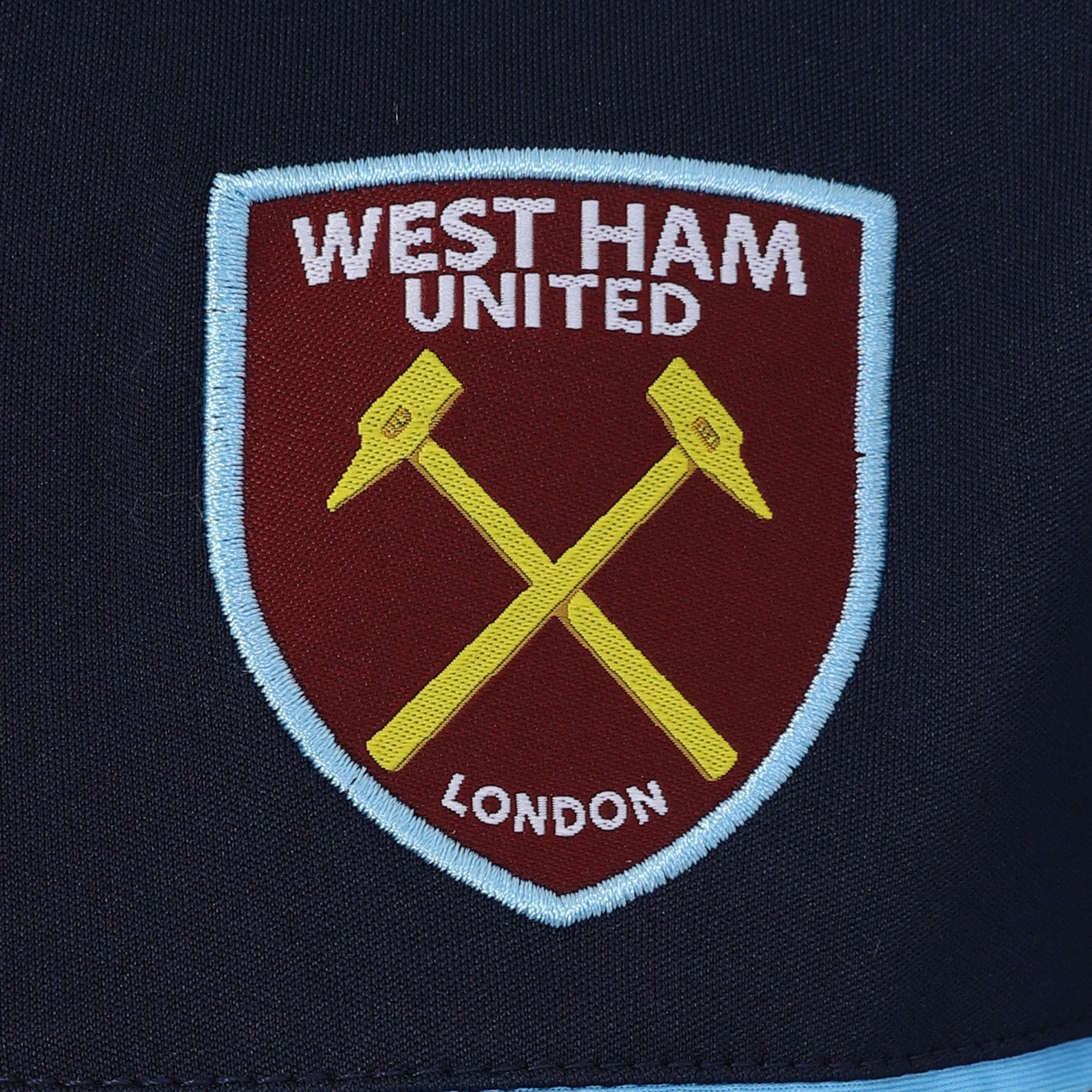 West Ham kids poly T-shirt in navy blue with club crest to chest