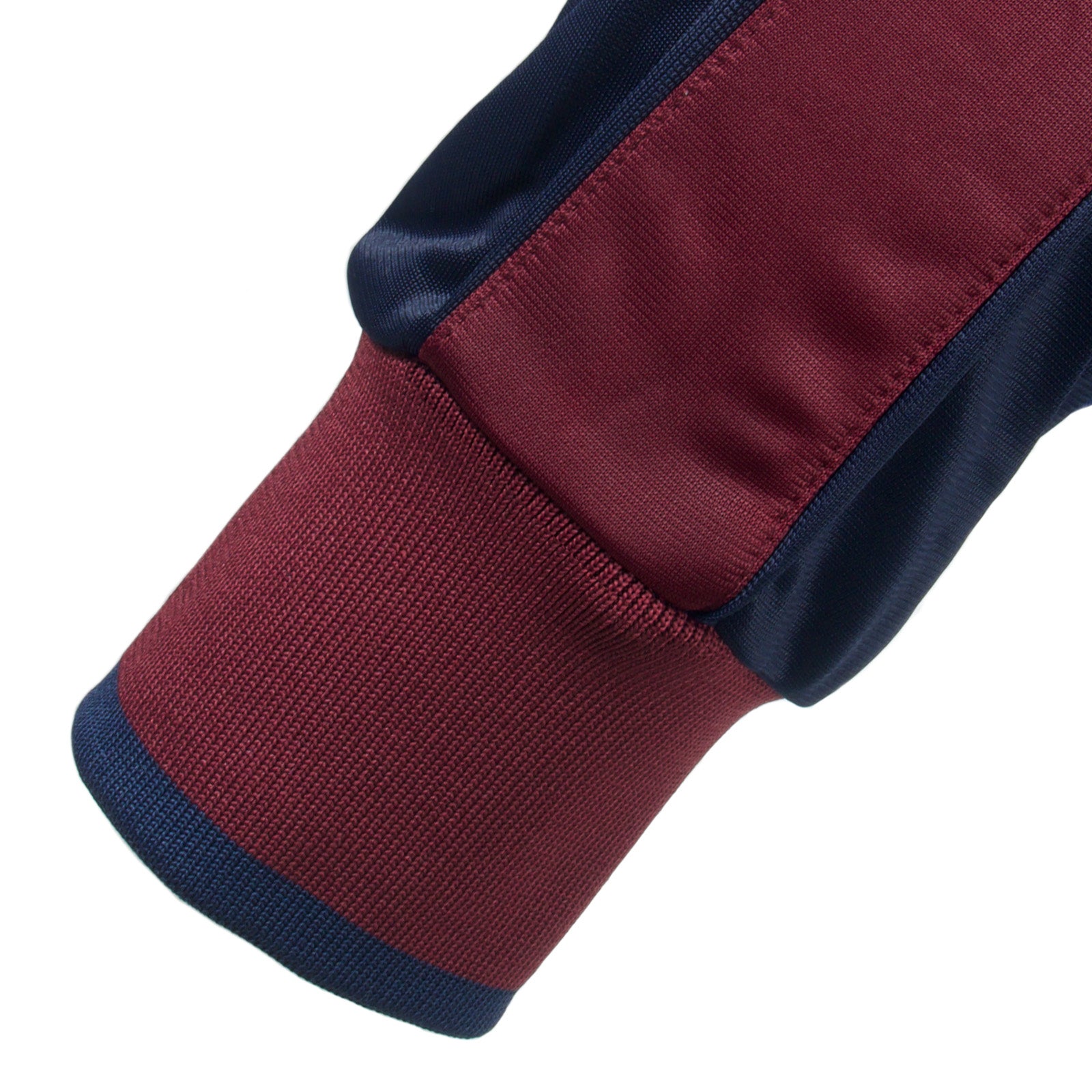 West Ham adults retro track jacket in navy blue with club crest to chest.