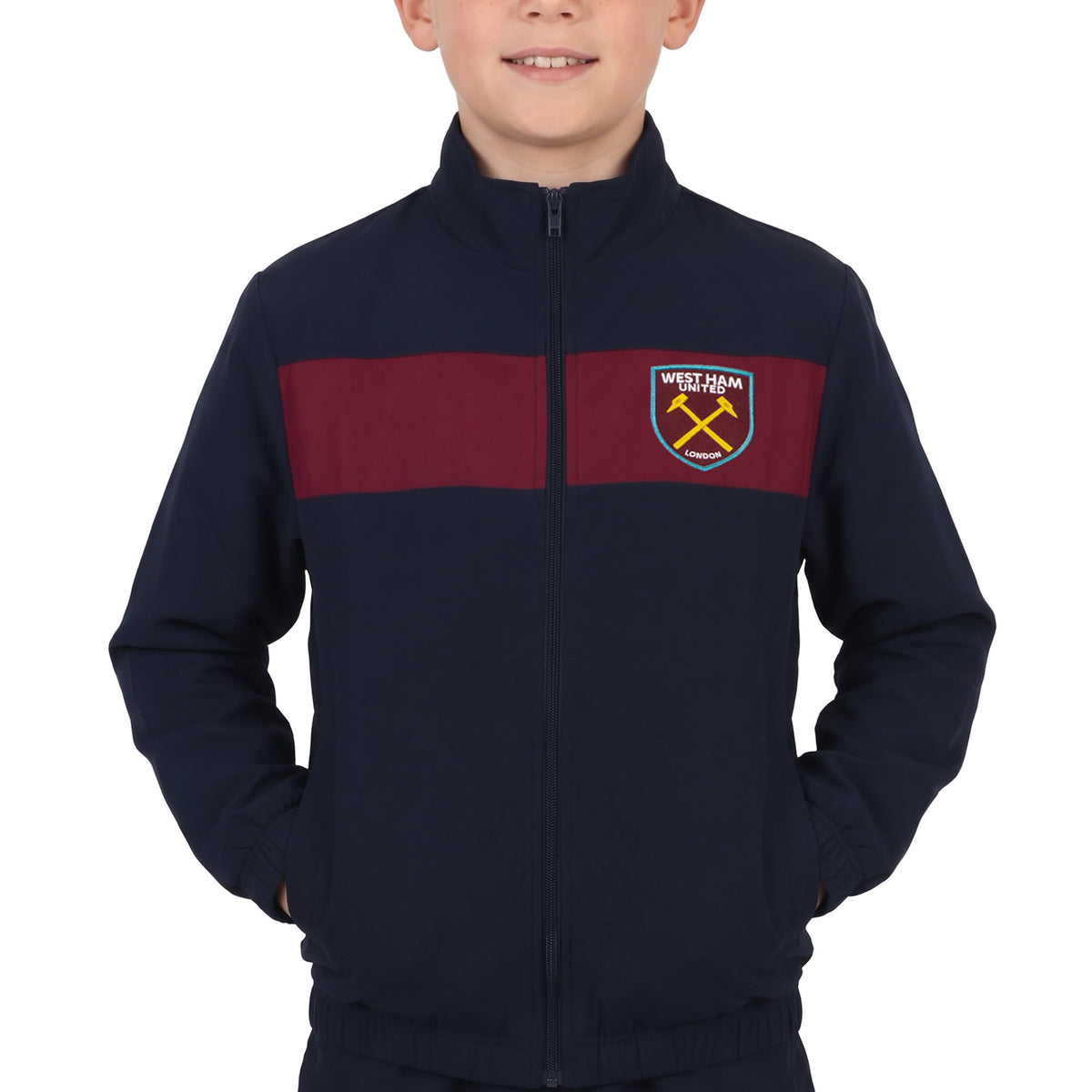 West Ham kids tracksuit in navy blue with club crest to chest and left thigh