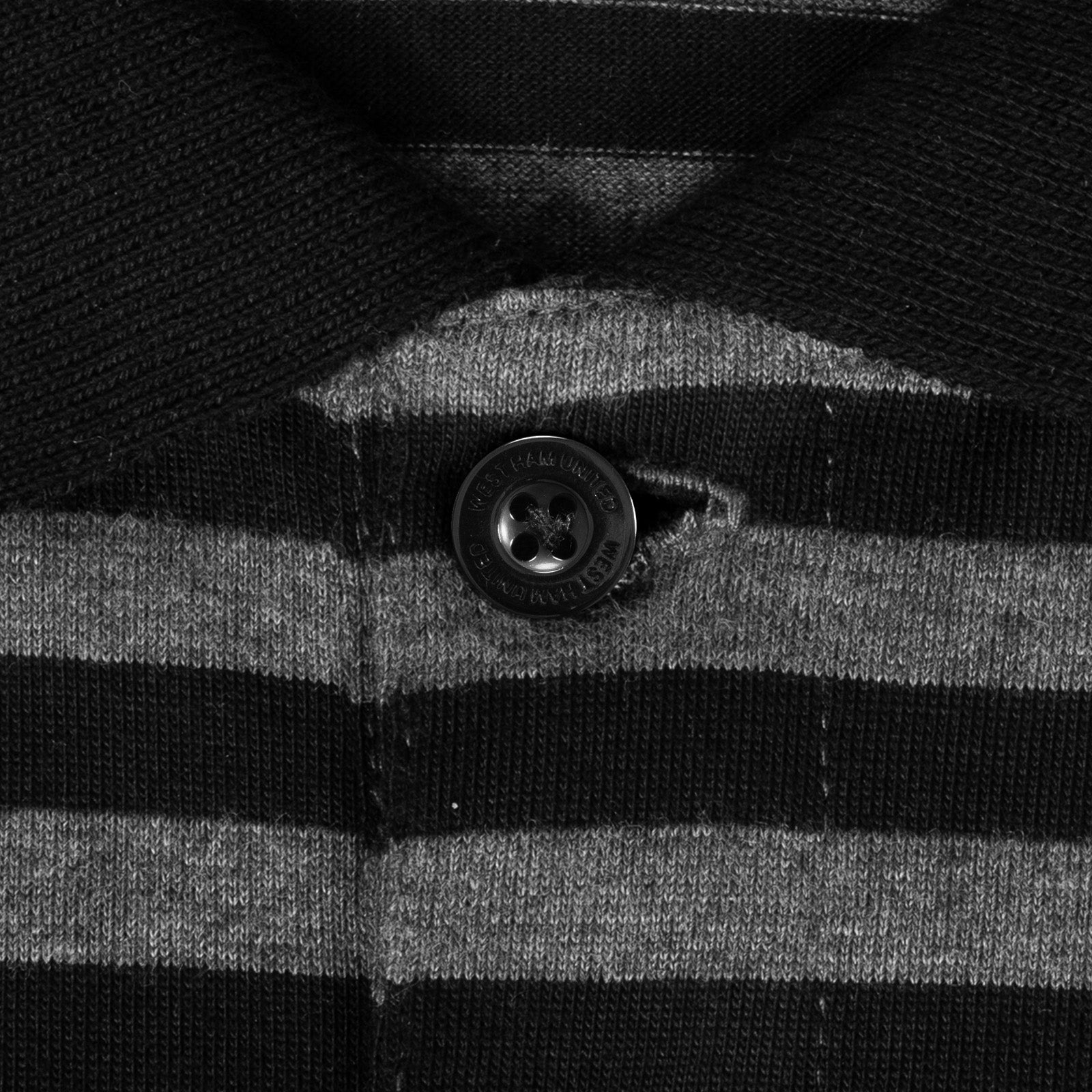 West Ham adults striped polo shirt in black & grey with club crest to chest.