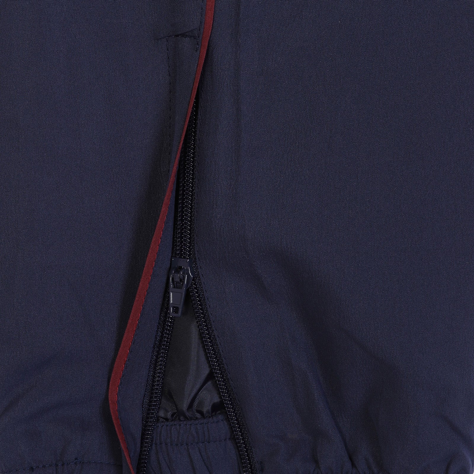 West Ham adults tracksuit in navy blue with club crest to chest and left thigh