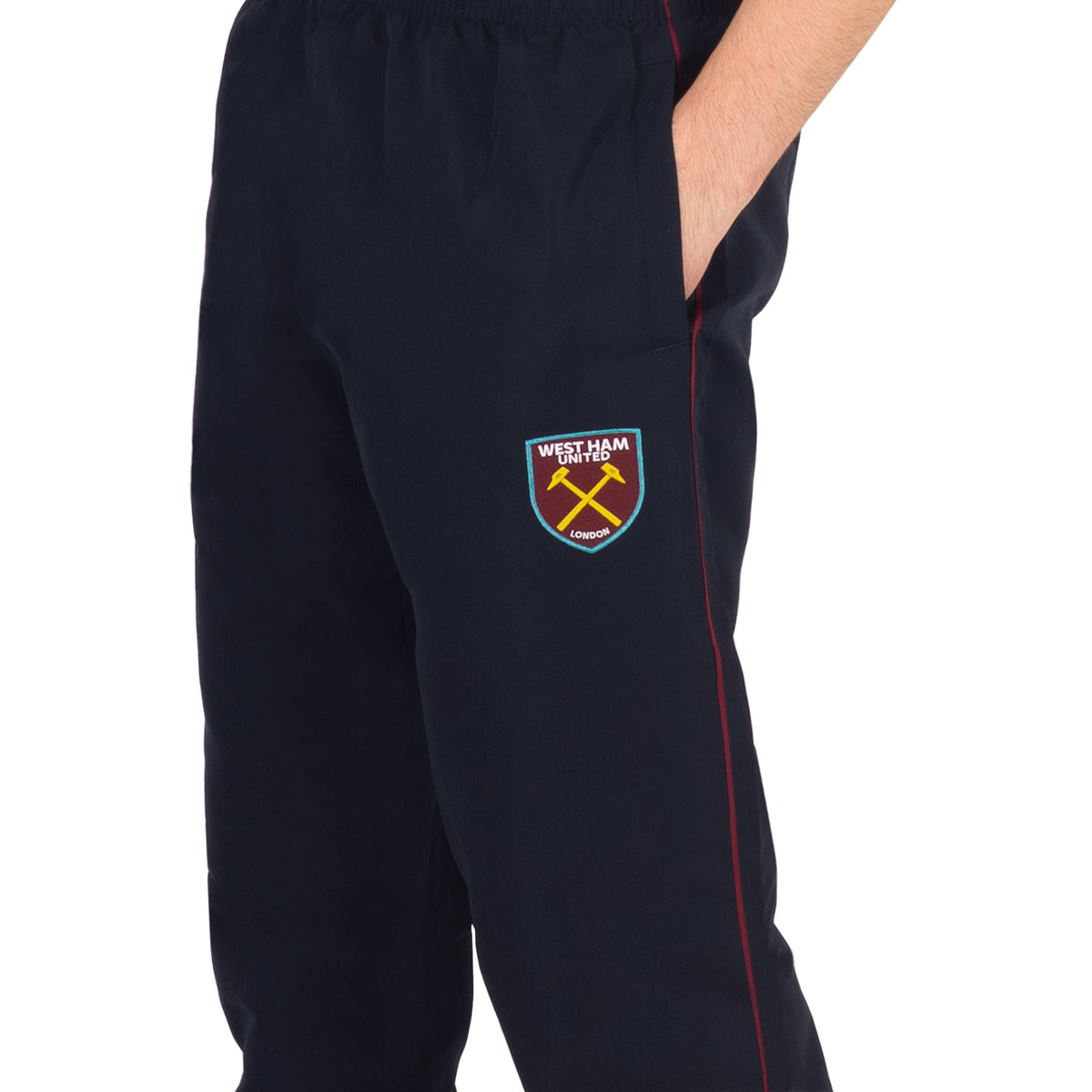 West Ham kids tracksuit in navy blue with club crest to chest and left thigh