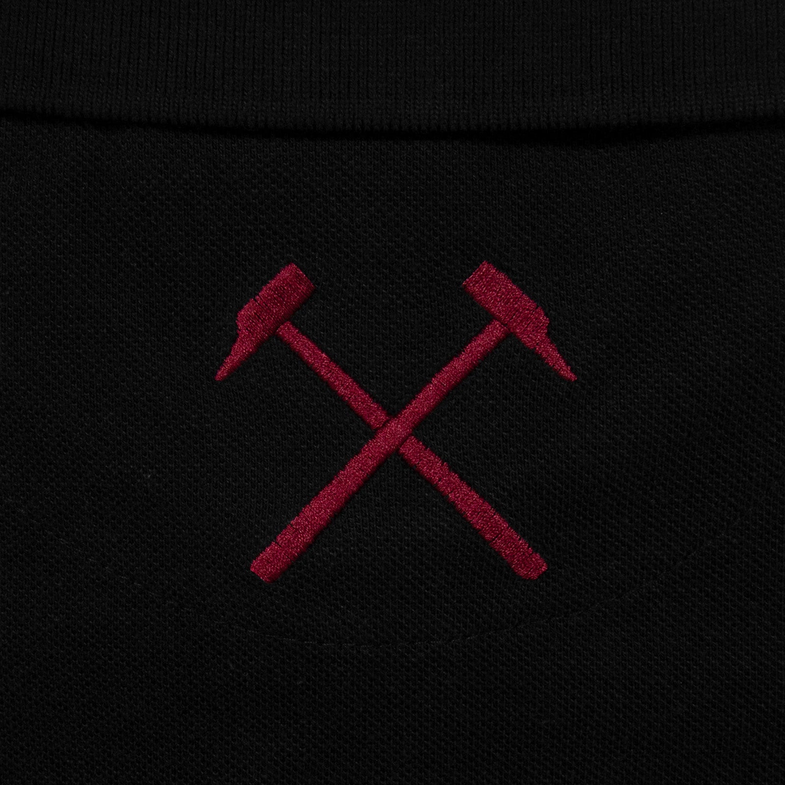 West Ham adults polo shirt in black with WHUFC badge and text to chest.