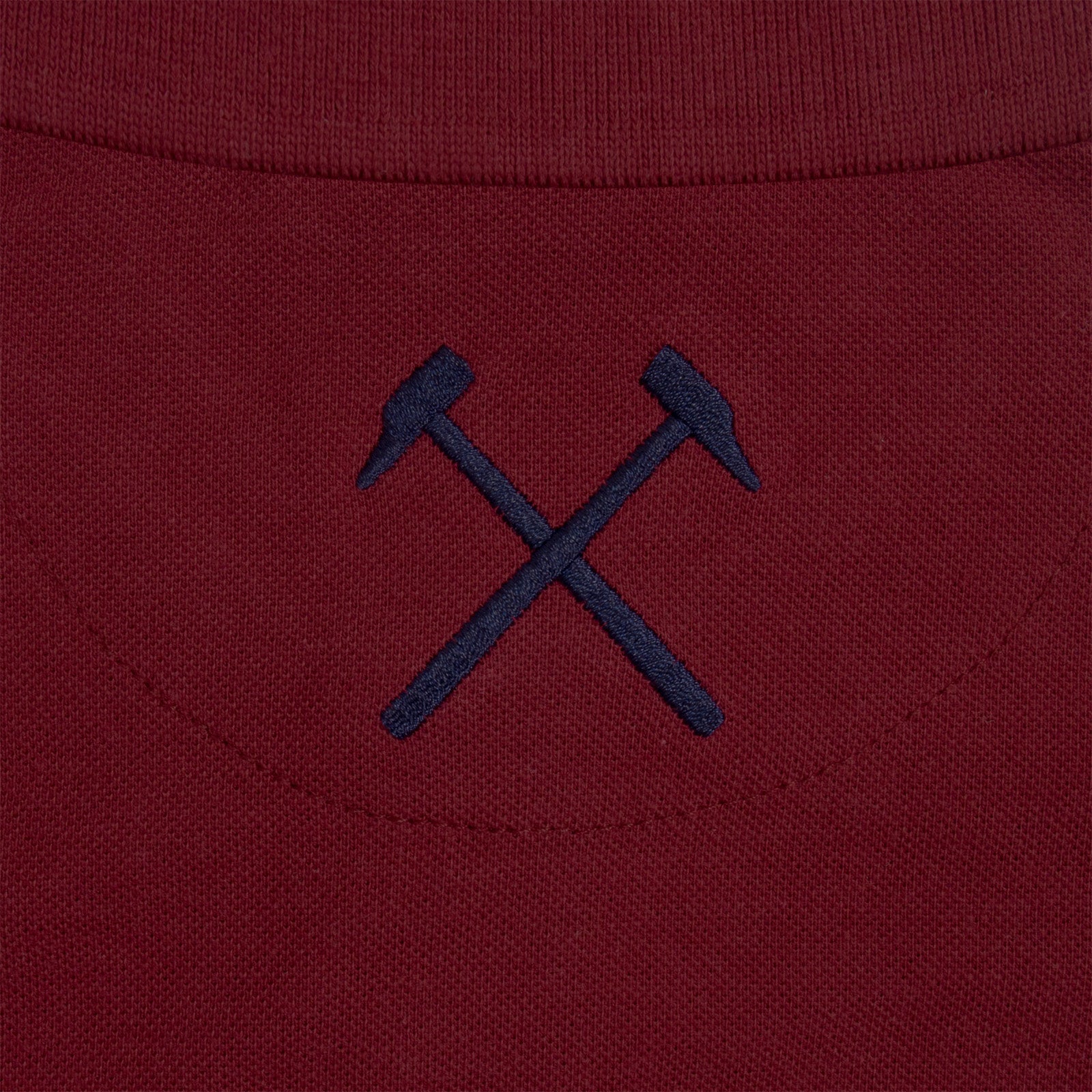 West Ham adults polo shirt in claret with WHUFC badge and text to chest.