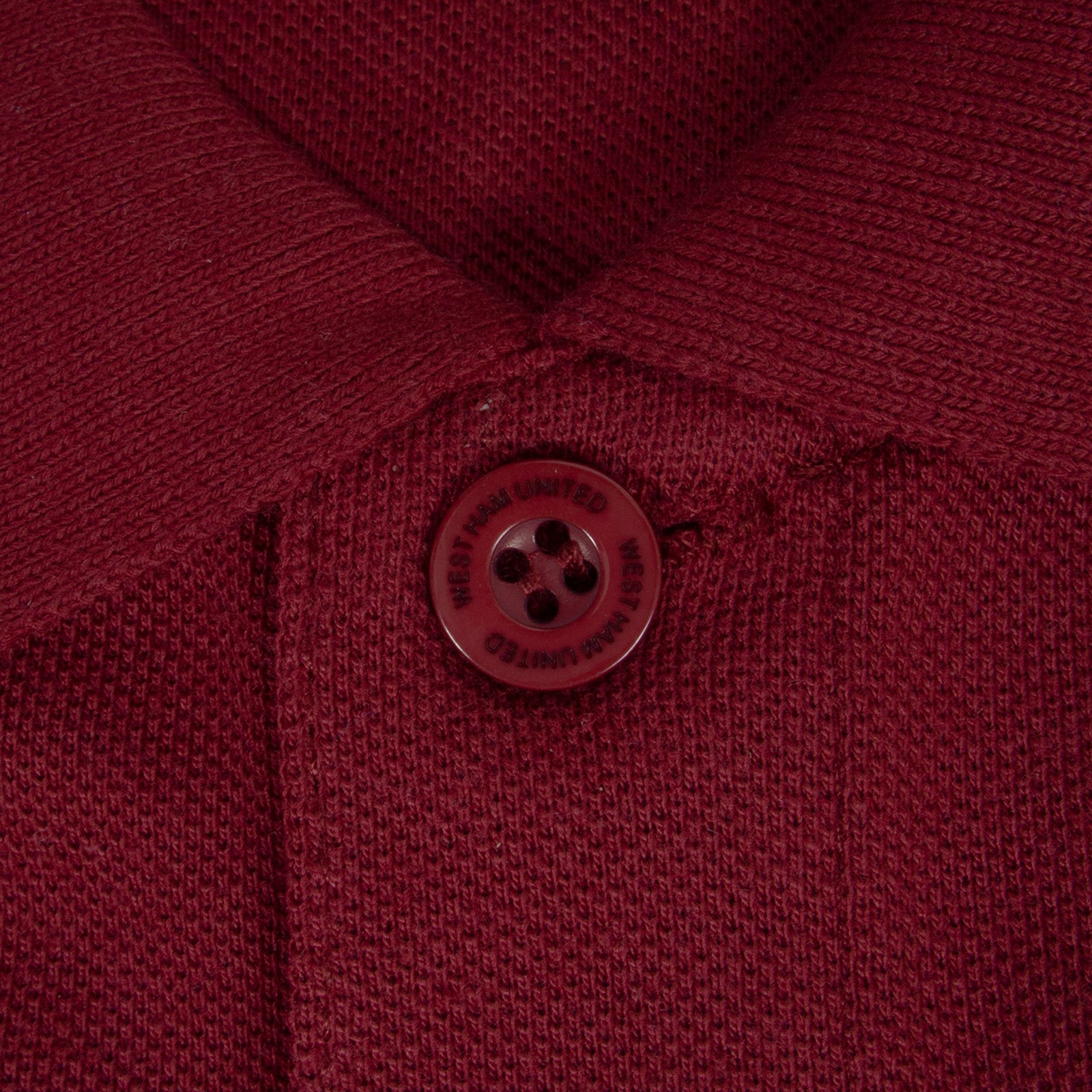 West Ham adults polo shirt in claret with WHUFC badge and text to chest.