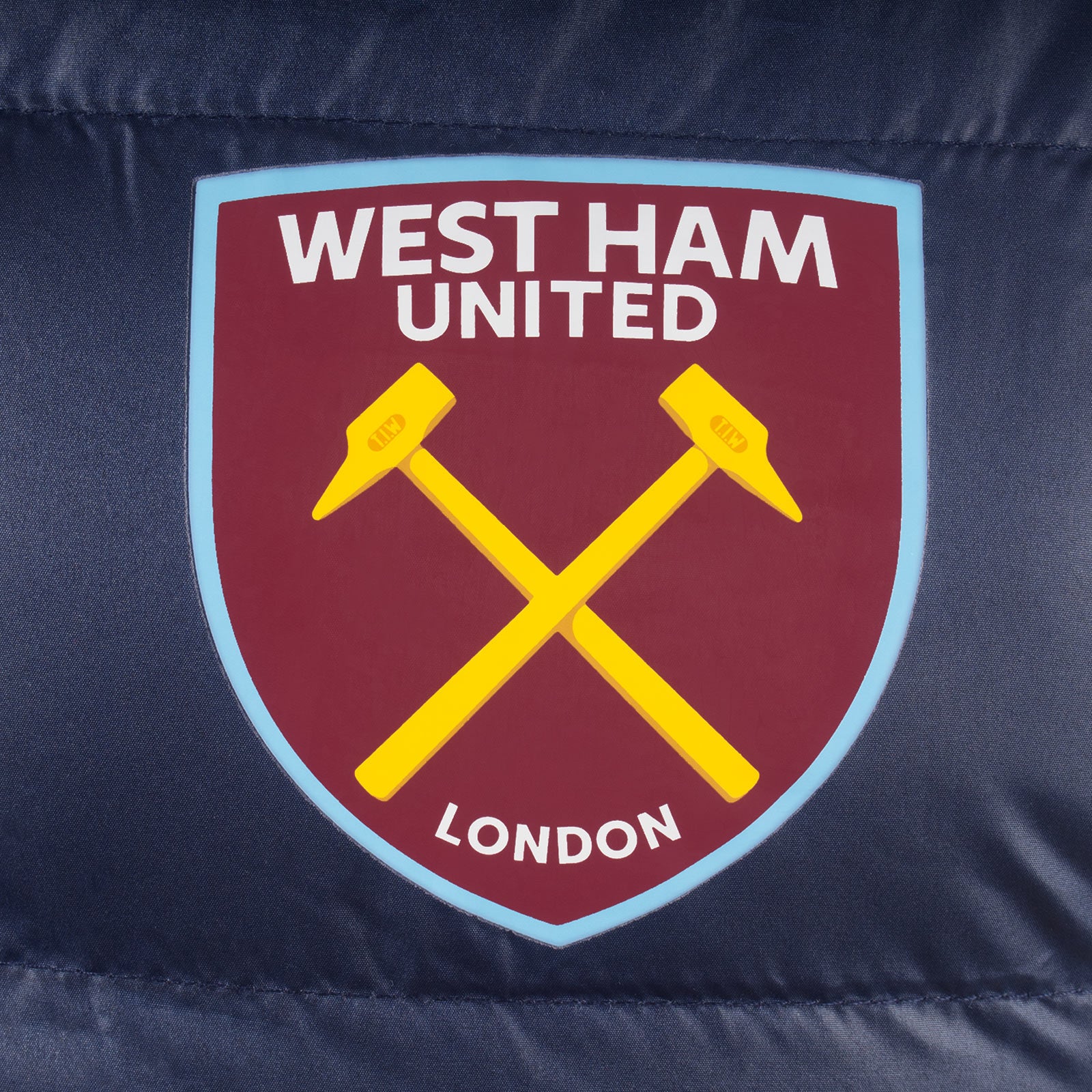 West Ham adults padded gilet in navy with full colour club crest to chest.