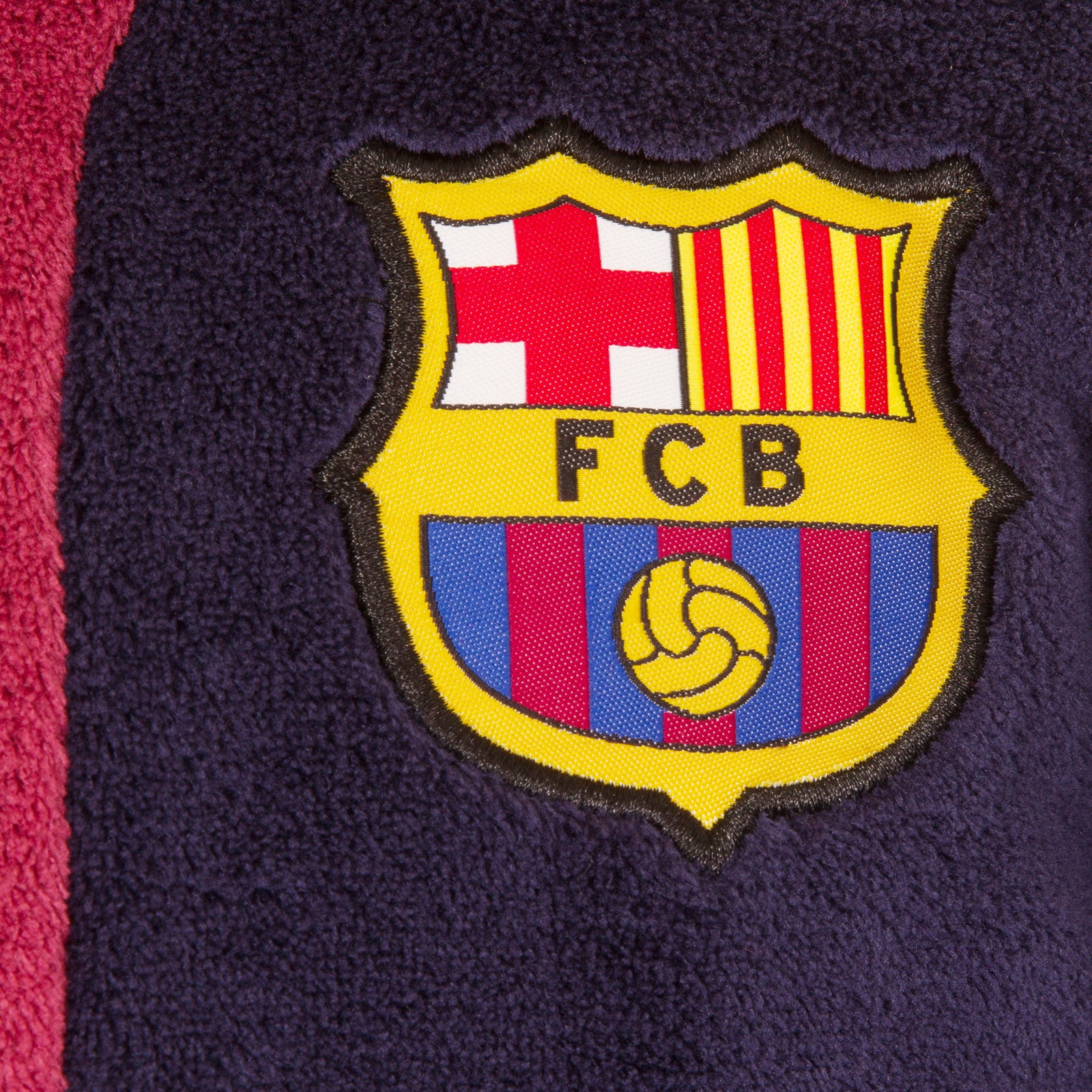 FC Barcelona kids hooded dressing gown in navy blue with FCB crest.