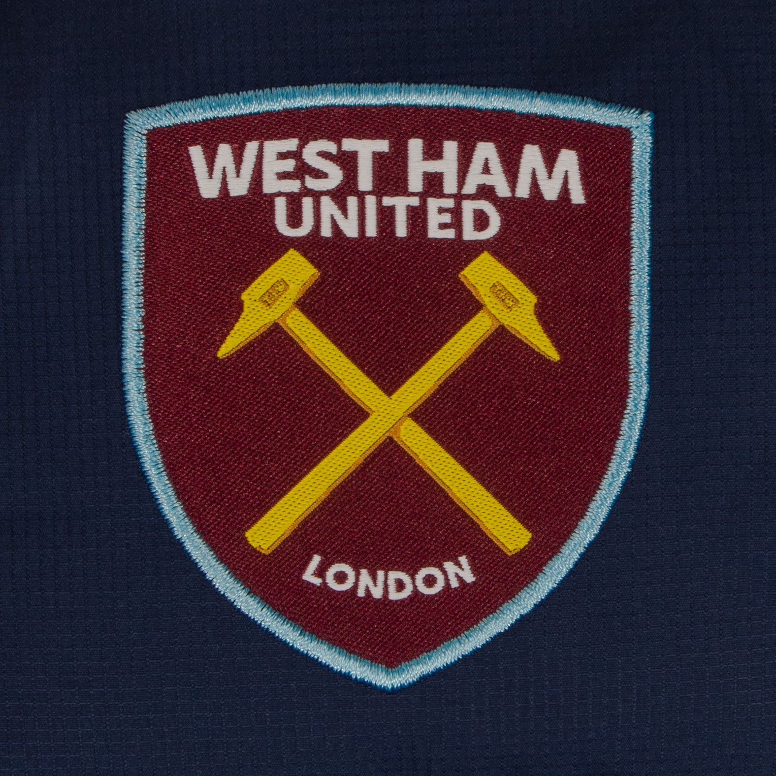 West Ham kids quilted jacket in navy with club crest to chest.