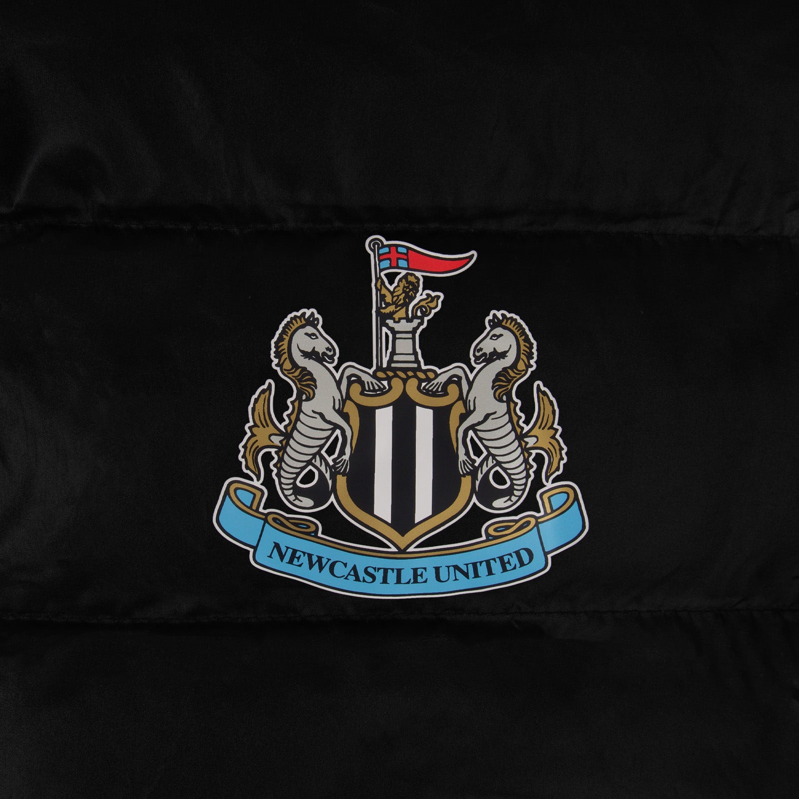 Newcastle United adults quilted jacket in black with club crest to chest.