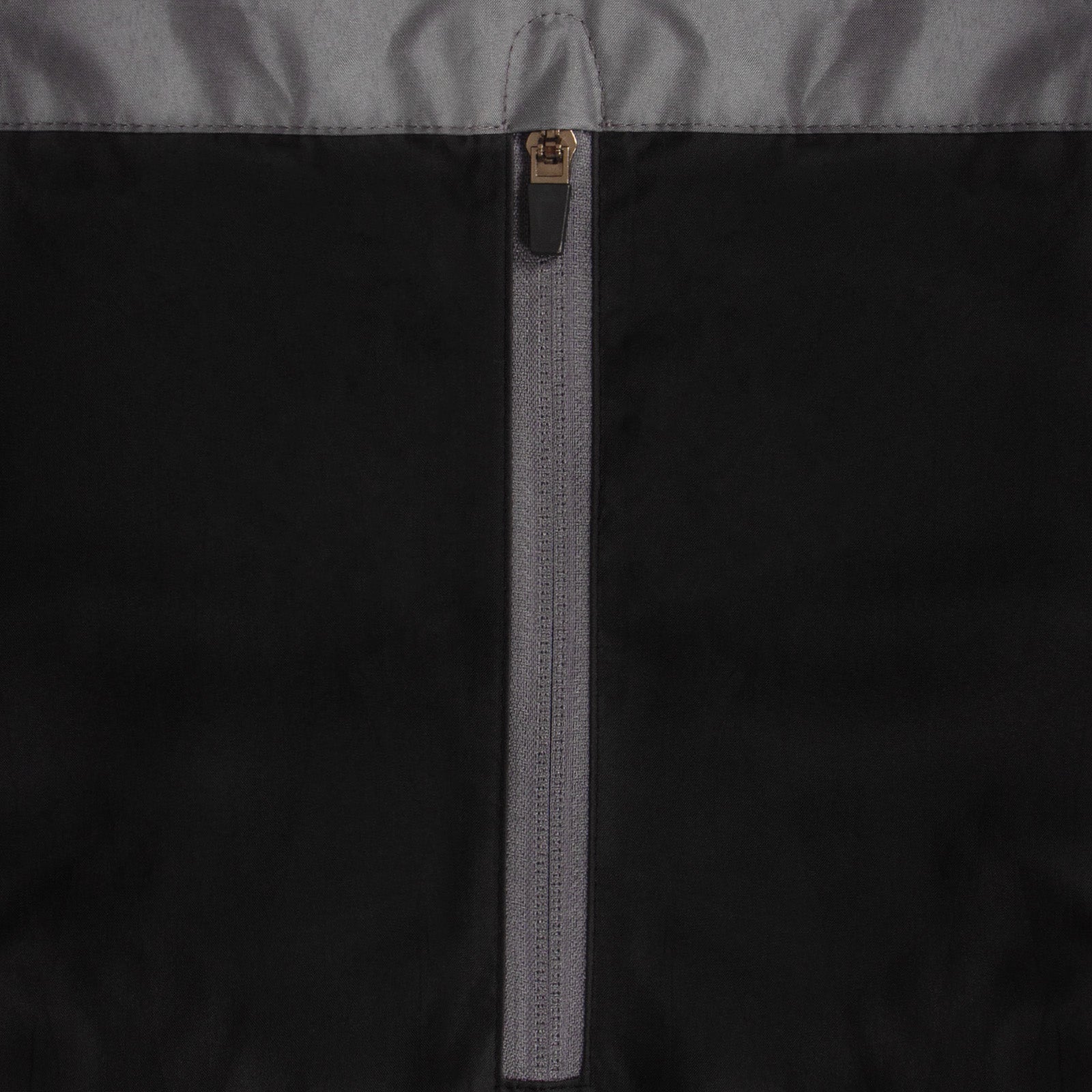 Newcastle Utd adults shower jacket in black & grey with club crest to chest .