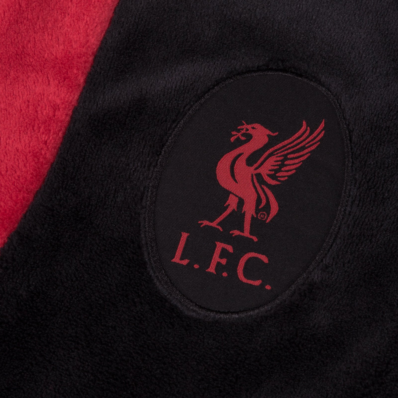 Liverpool kids hooded dressing gown in black with a crest