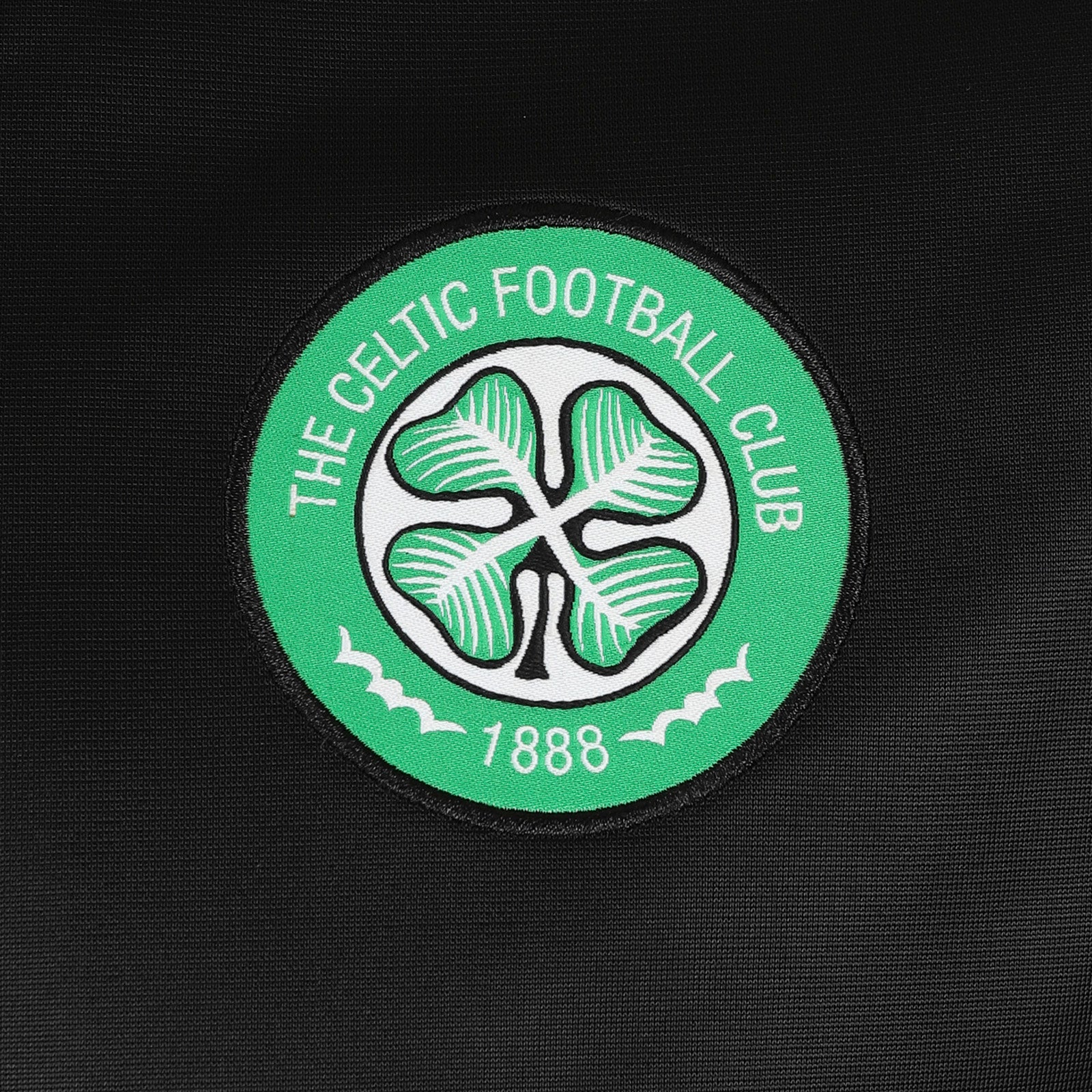 Celtic adults track jacket in black with retro crest on the chest.