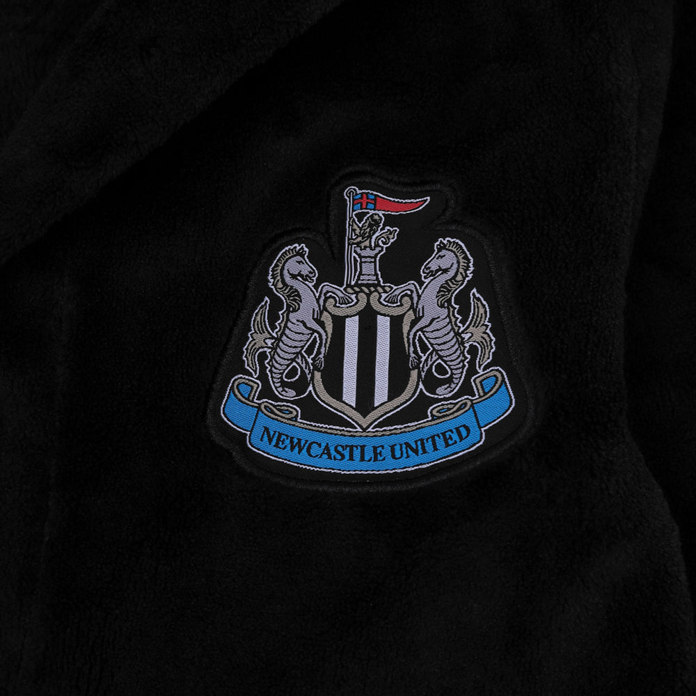 Newcastle United kids hooded dressing gown in black with crest