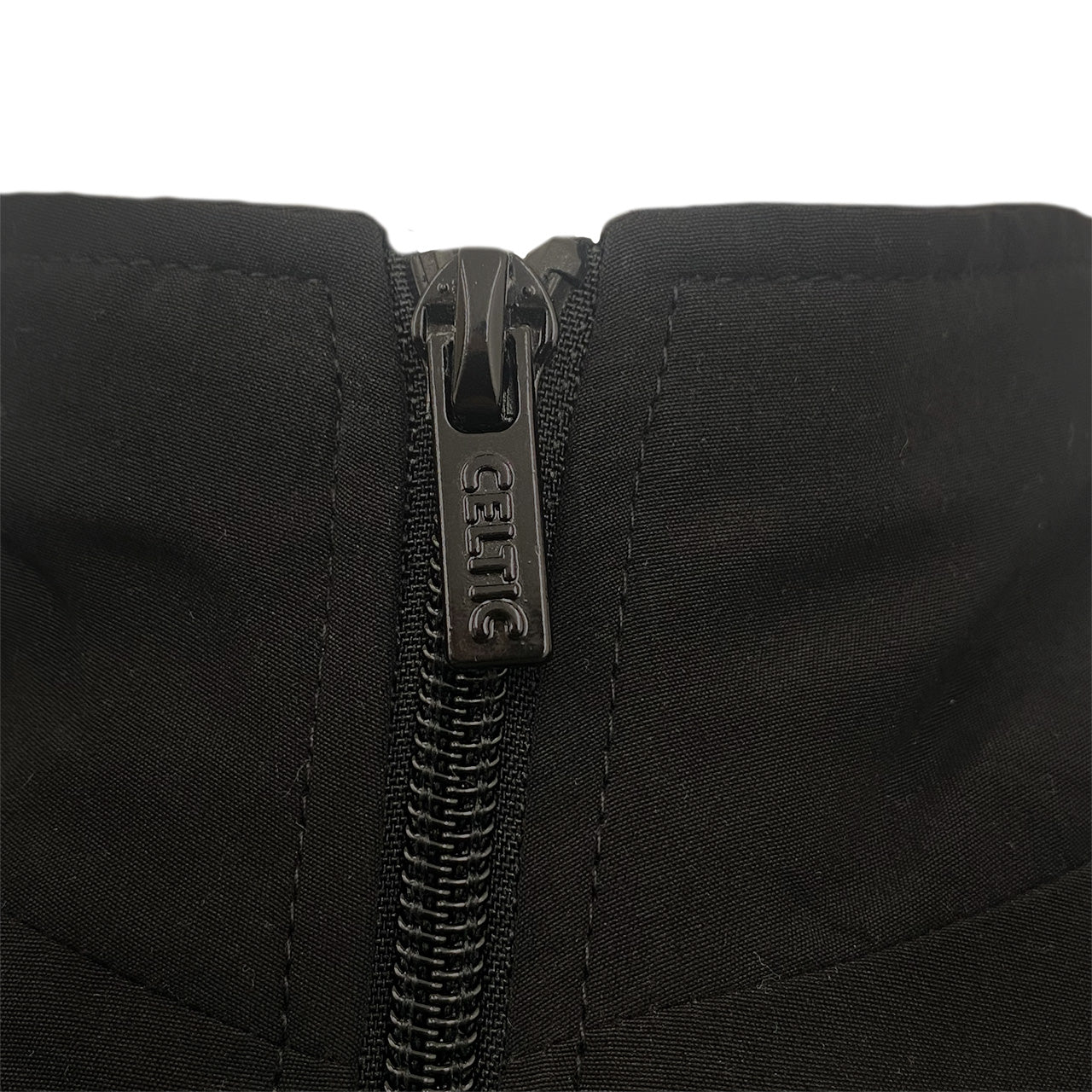 Celtic kids tracksuit in black with club crest to chest and left thigh