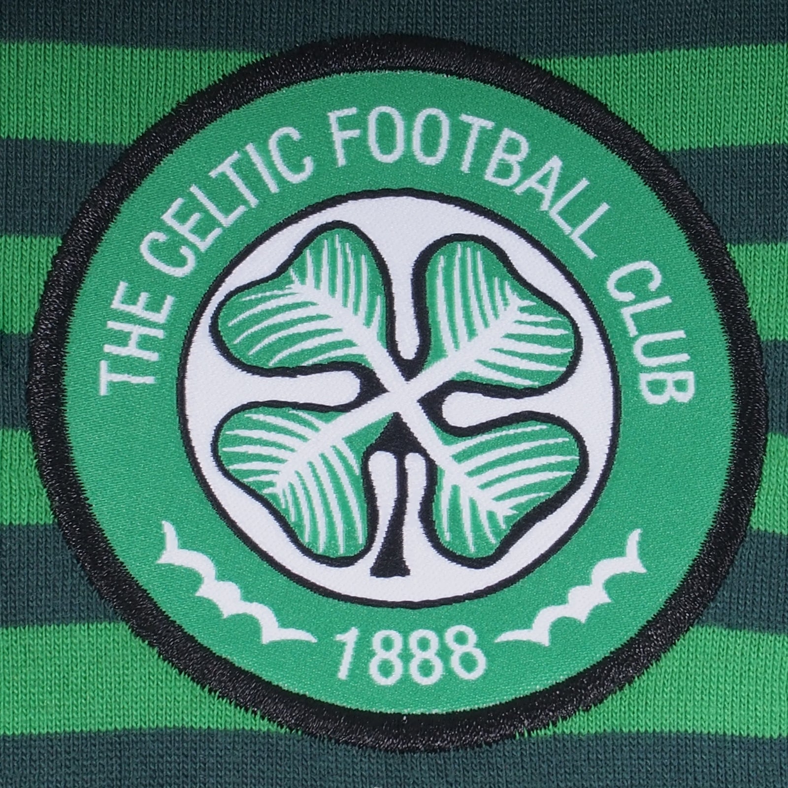 Celtic adults striped polo shirt for adults in green & black with club crest to chest.
