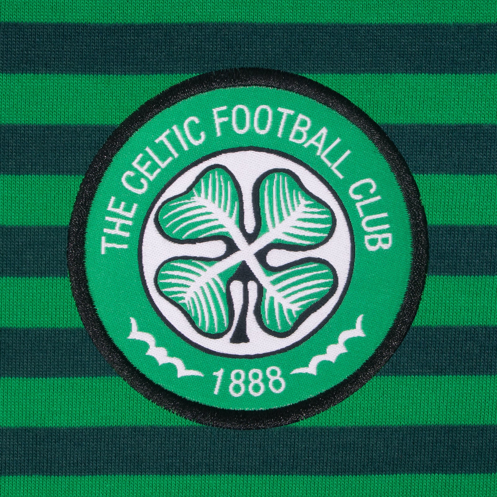 Celtic adults striped polo shirt for adults in green & black with club crest to chest.