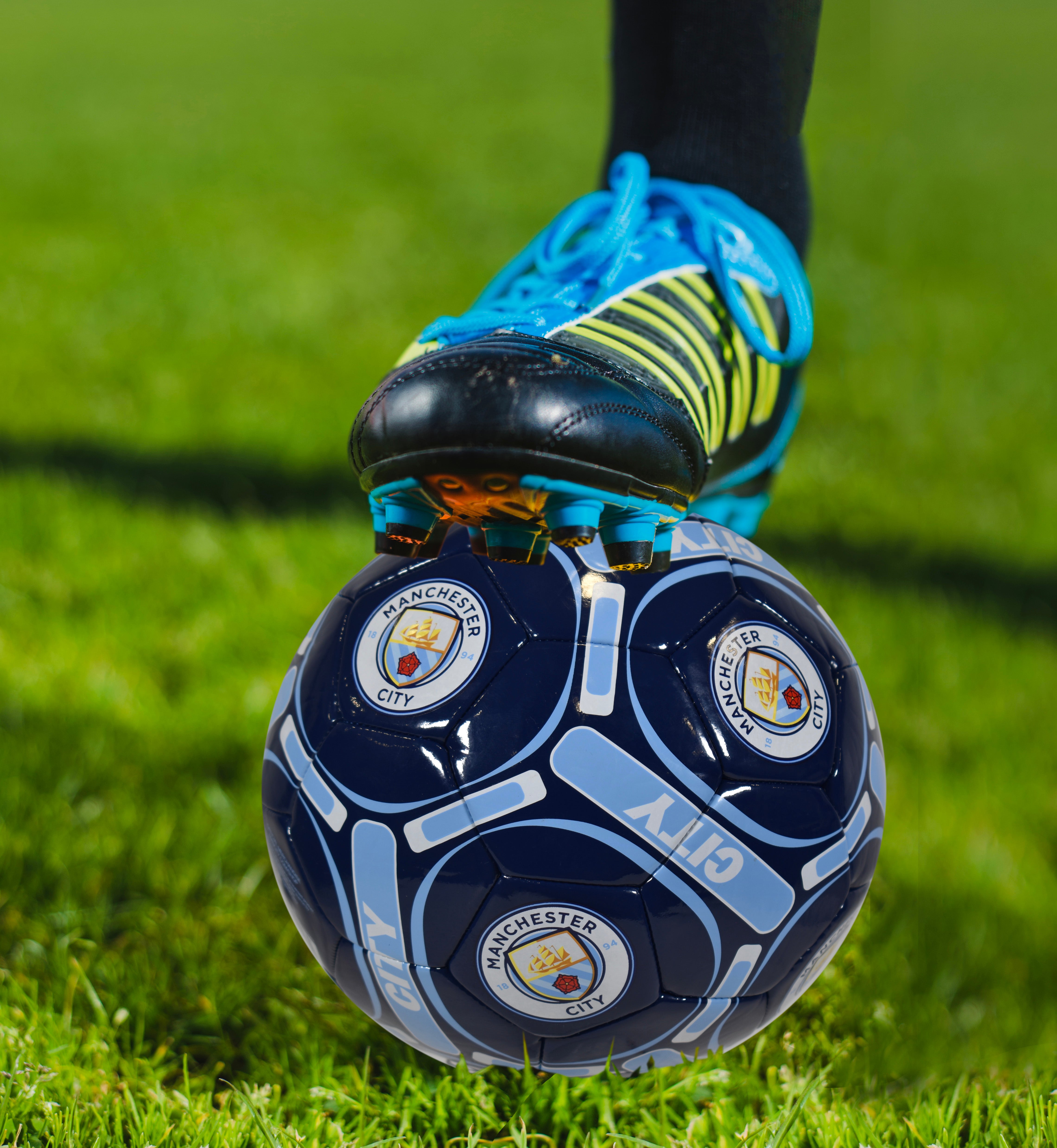 Man City size 4 blue football with MCFC crests & text.