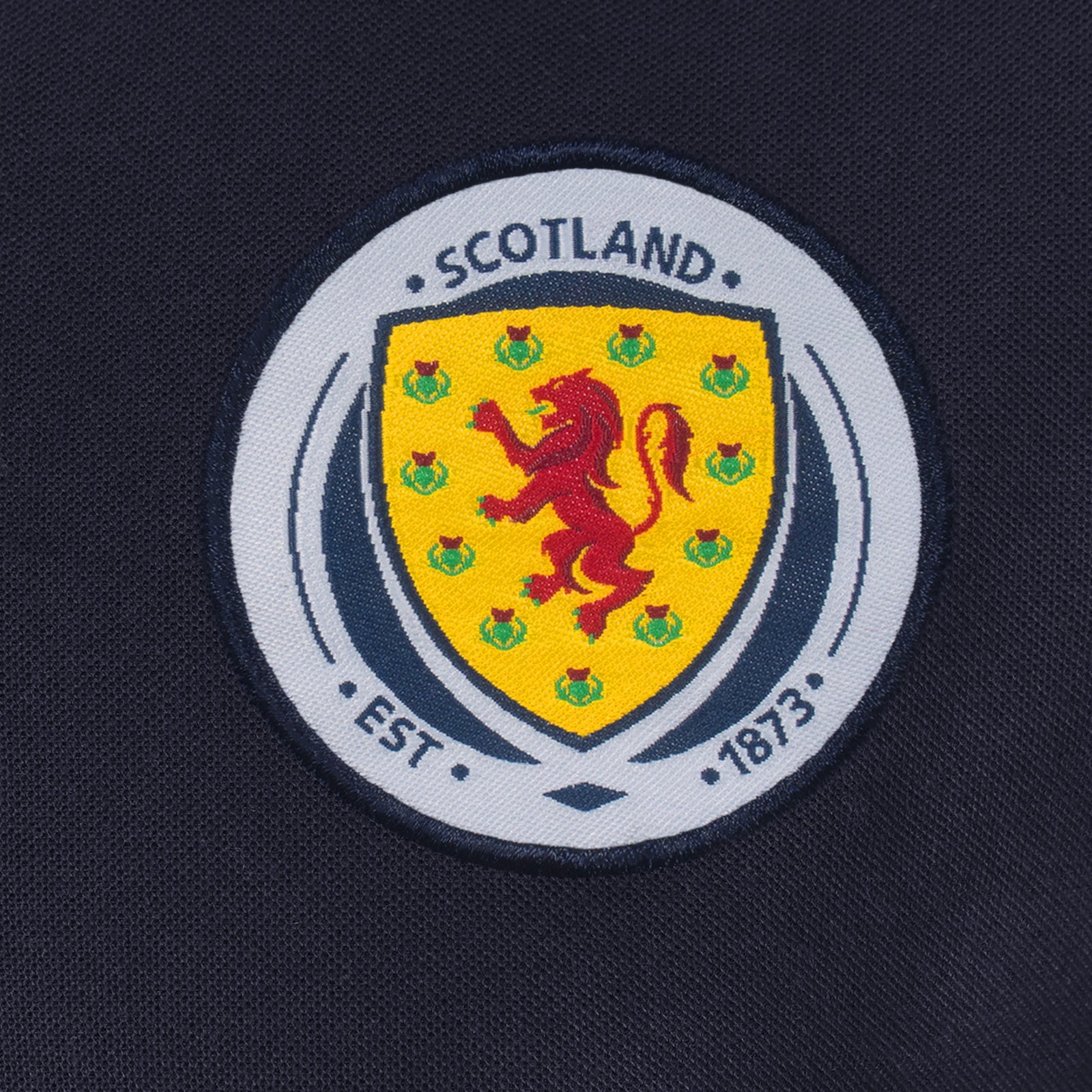 Scotland FA polo shirt for adults in navy blue with national team crest to chest.