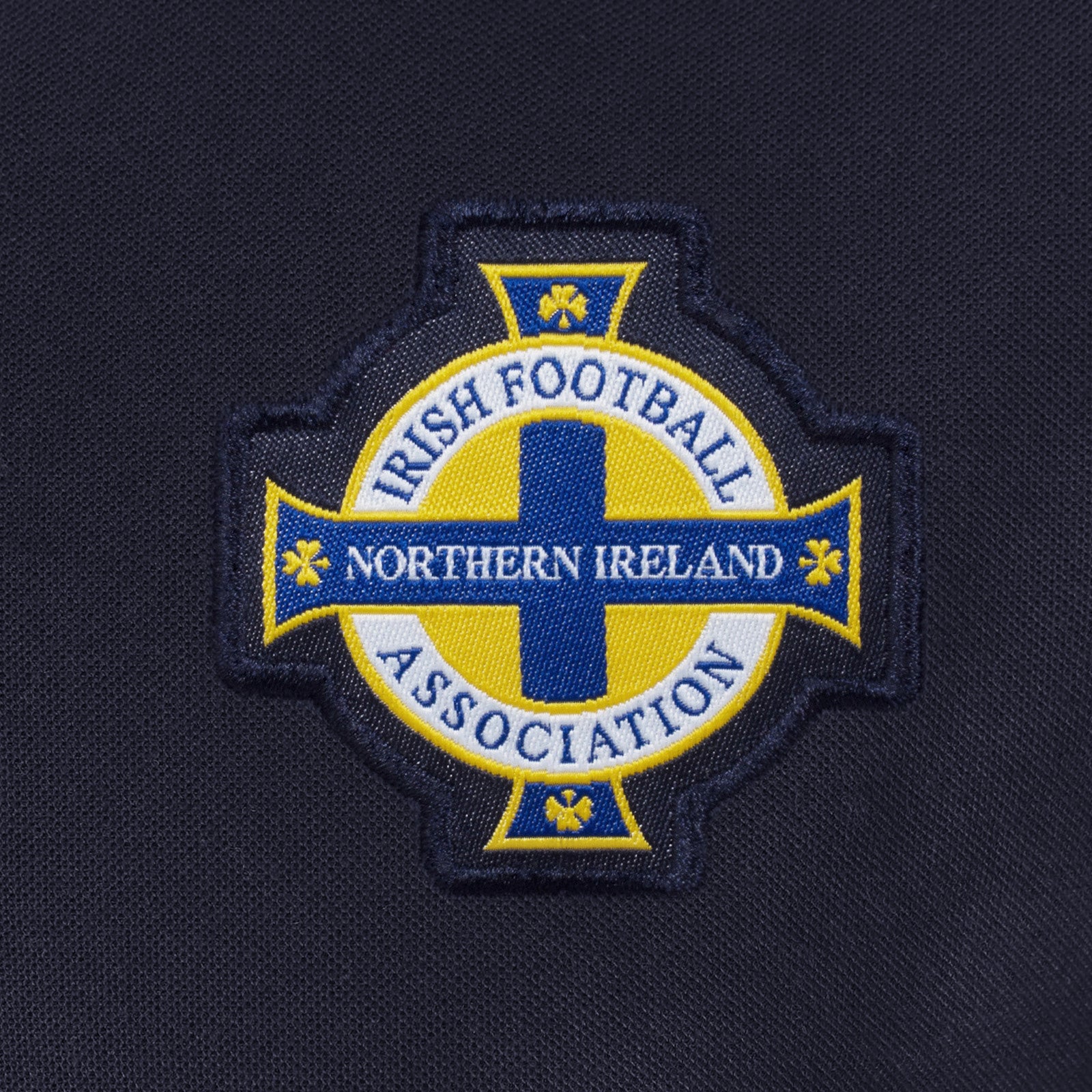 Northern Ireland polo shirt for adults in navy blue with national team crest to chest.