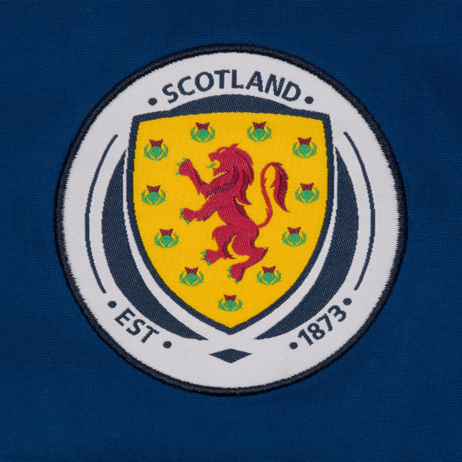 Scotland FA adults tracksuit in navy blue with national crest to chest and left thigh