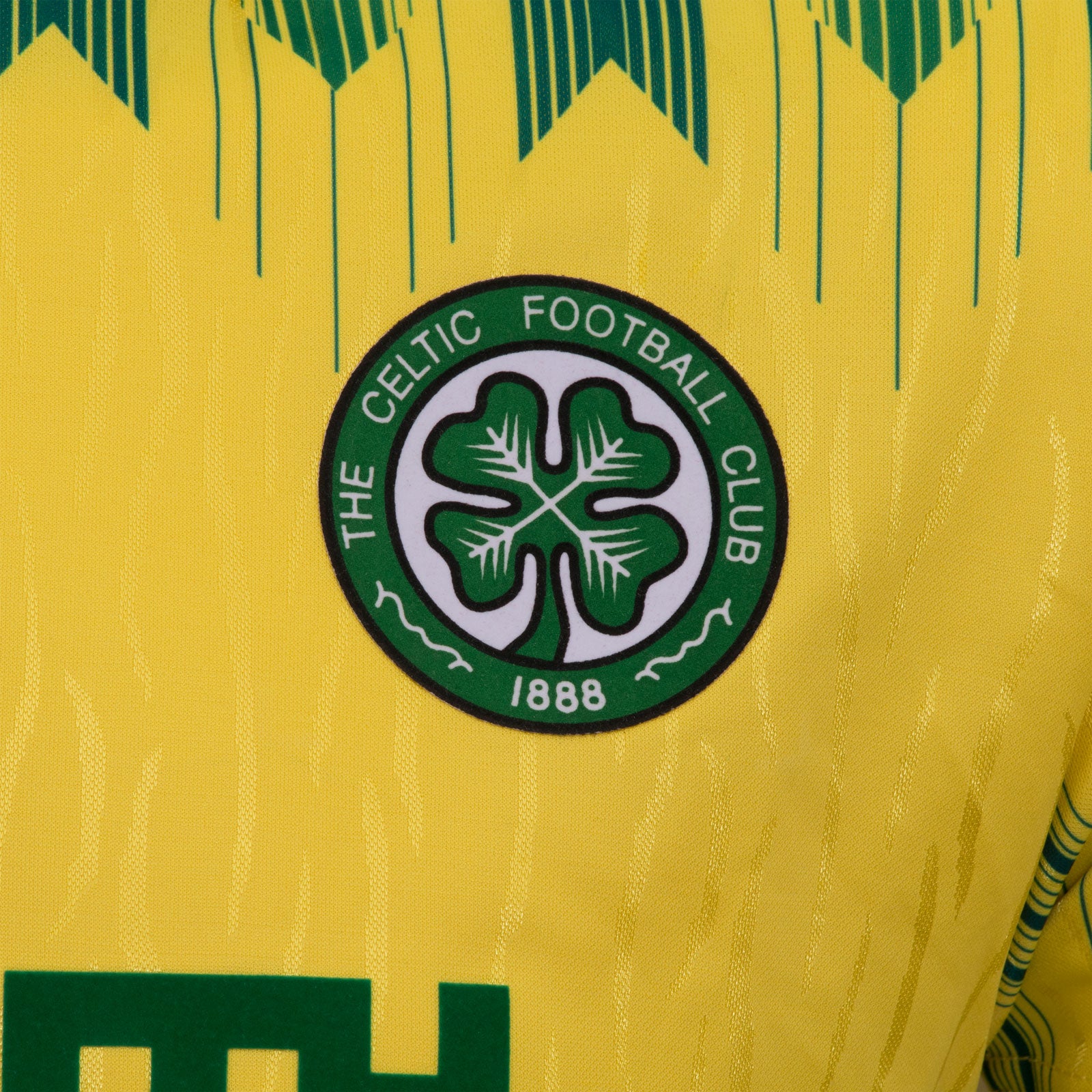 Celtic retro football shirt. Replica 1989/91 away shirt in yellow with club crest and sponsor print to front