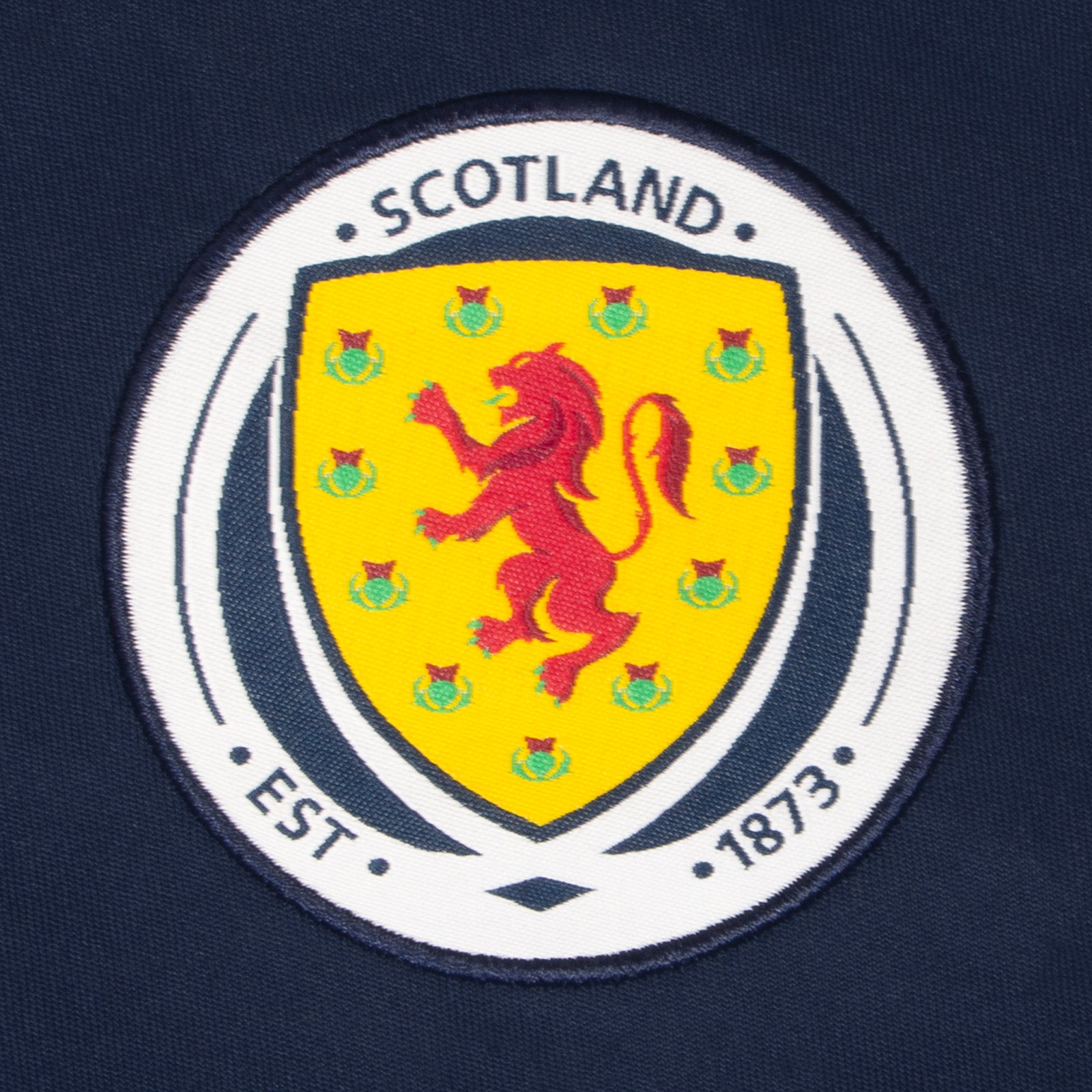 Scotland adults poly T-shirt in navy blue with national team crest to chest.